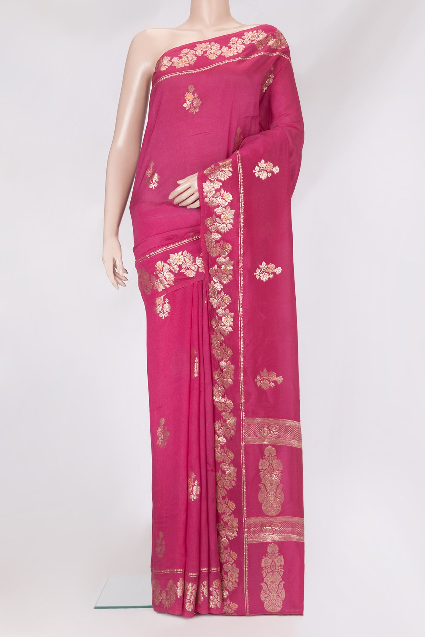 Magenta Dual Tone Tussar Silk Saree with Zari Butta on the body and Fancy Border.  displayed on a mannequin