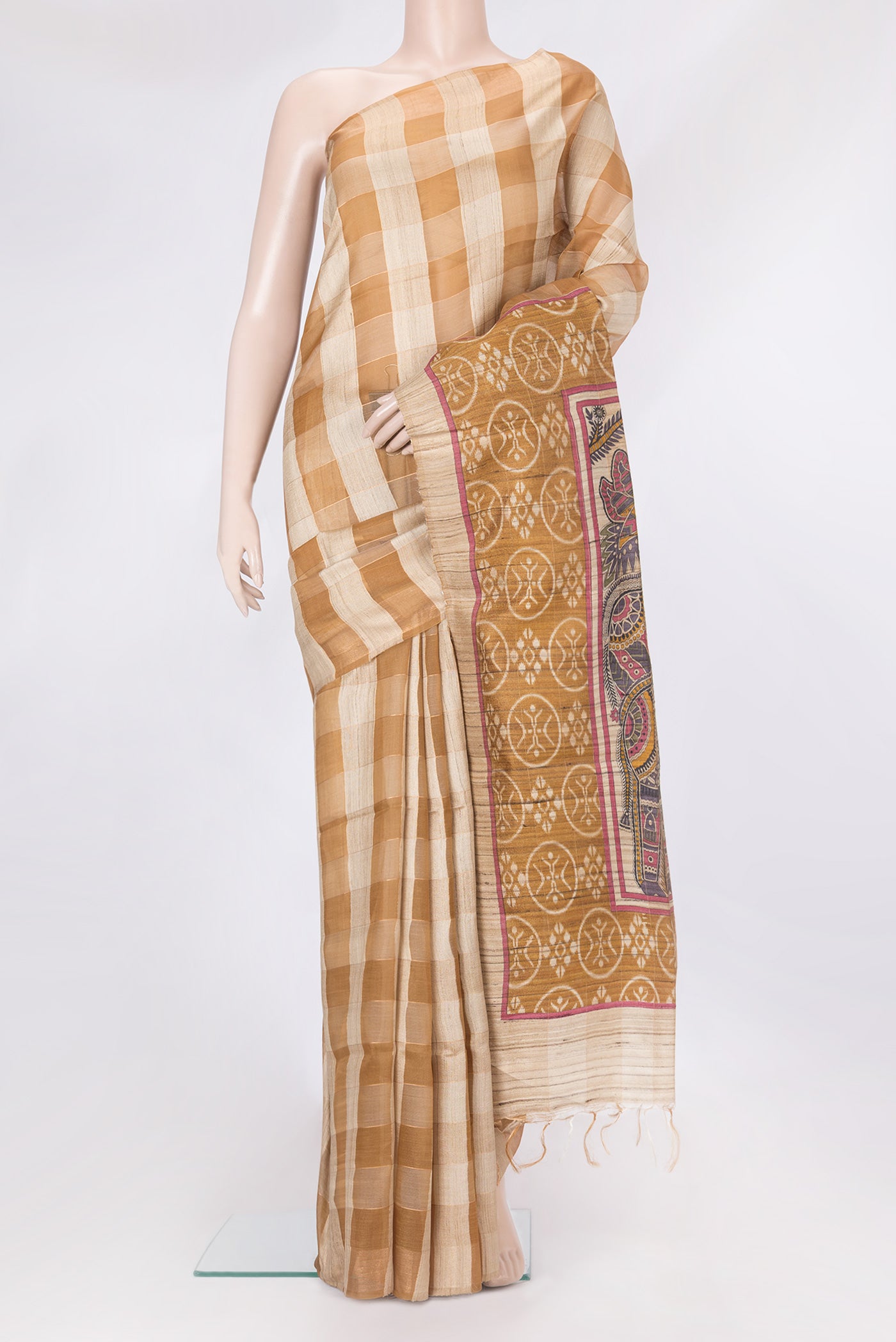 Beige Tussar Silk Saree with Checked design on the body and Without Border.  displayed on a mannequin