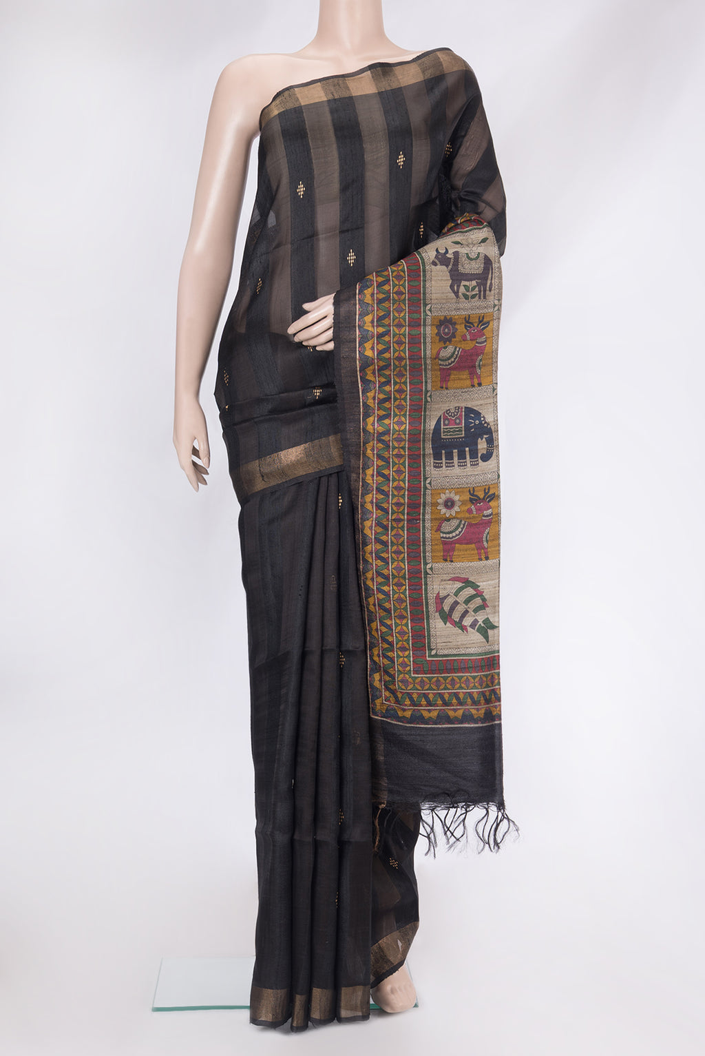 Black Tussar Silk Saree with Stripes on the body and Zari Border.  displayed on a mannequin