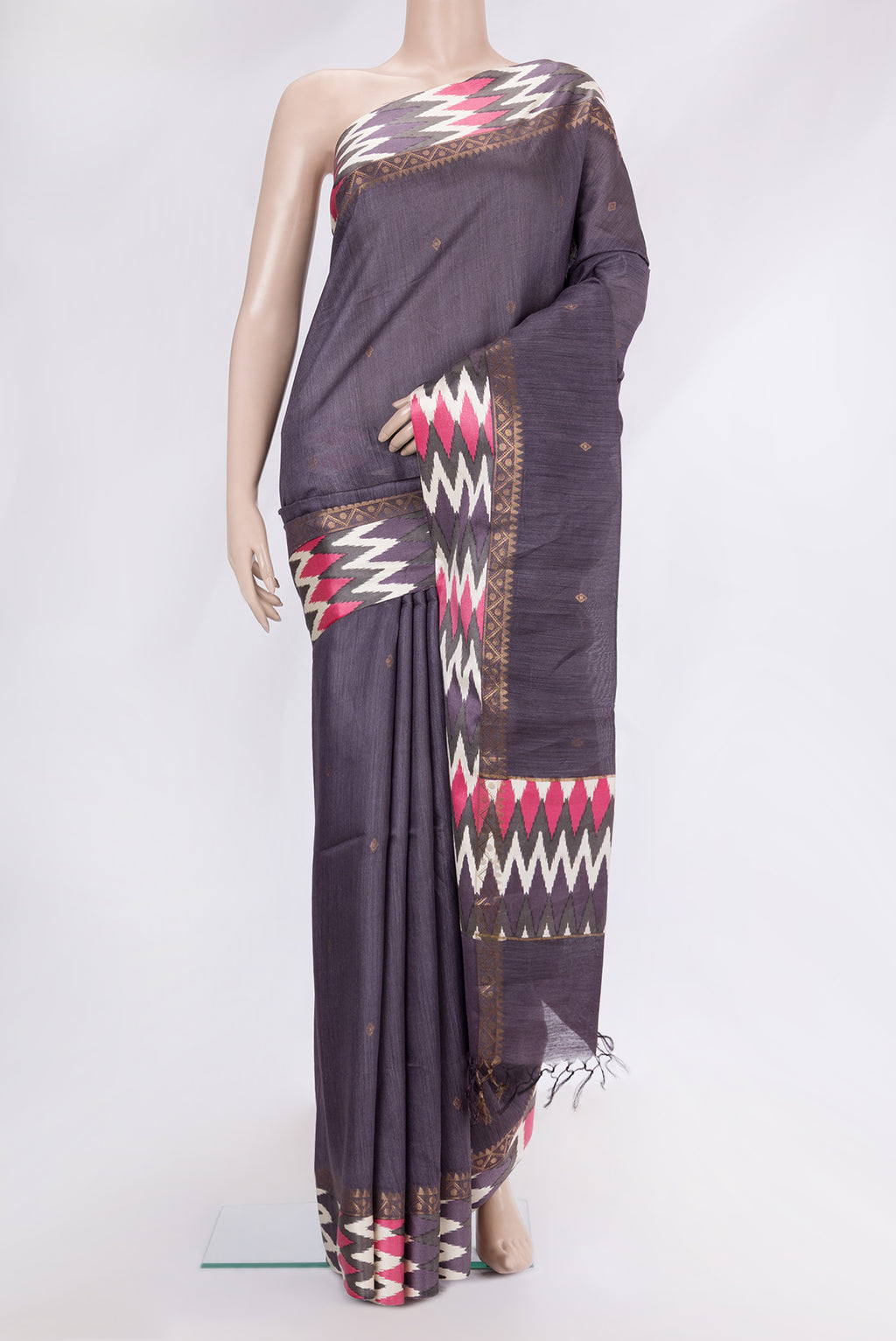 Purple Tussar Silk Saree with Zari Butta on the body and Ikat Border.  displayed on a mannequin