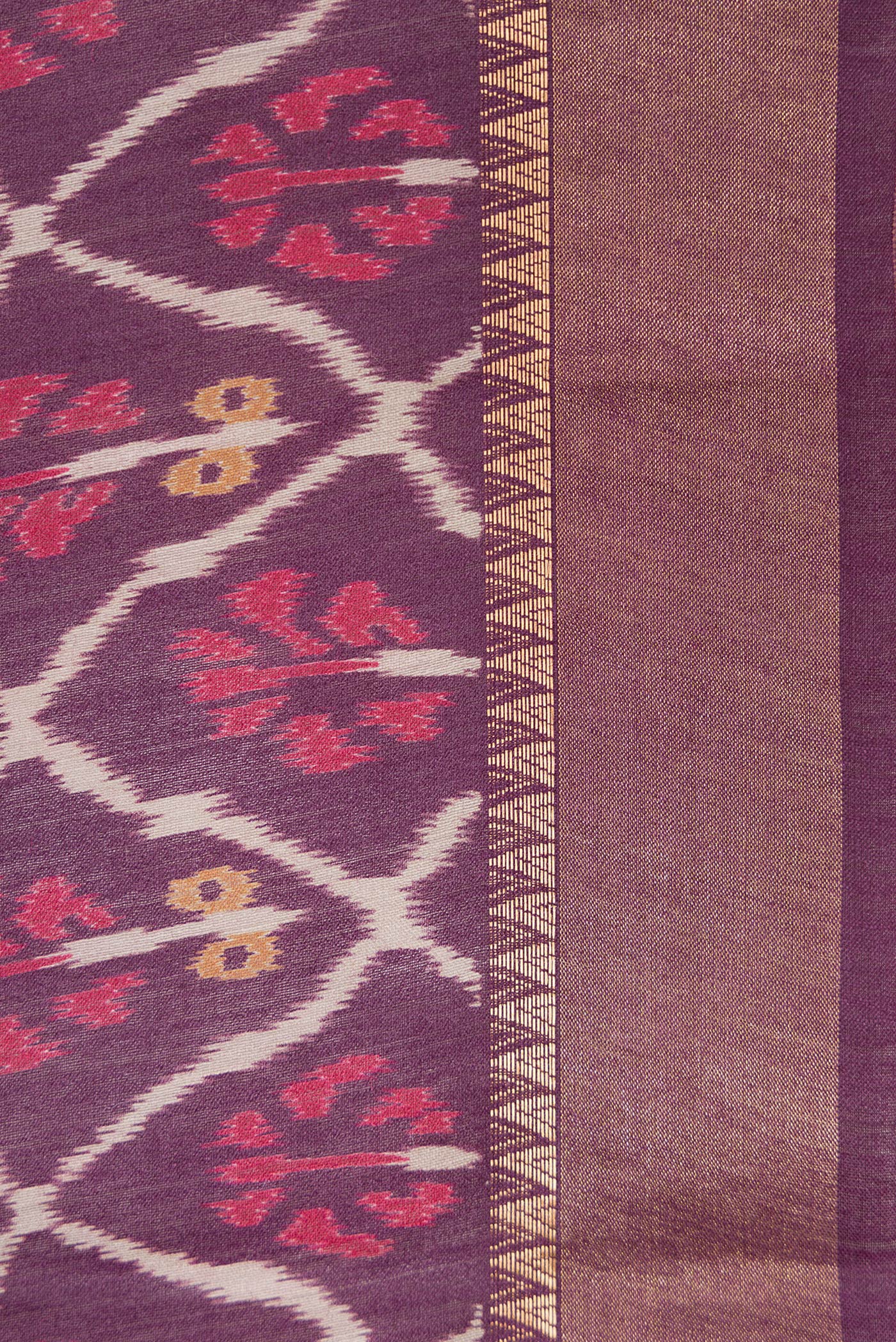 Border image of Purple Dual Tone Tussar Silk Saree with Ikat Print on the body and Zari Border. 