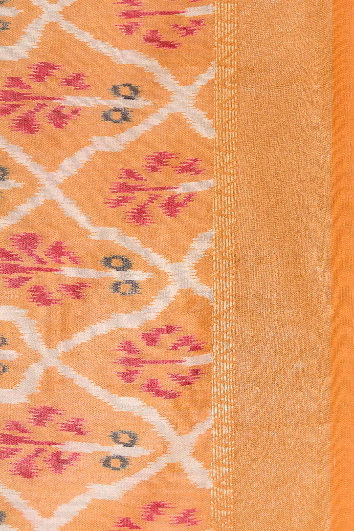 Border image of Mustard Dual Tone Tussar Silk Saree with Ikat Print on the body and Zari Border. 