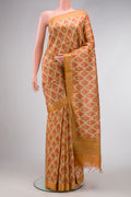 Mustard Dual Tone Tussar Silk Saree with Ikat Print on the body and Zari Border.  displayed on a mannequin