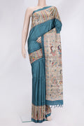 Sky Blue Dual Tone Tussar Silk Saree with Plain Body and Fancy Border.  displayed on a mannequin