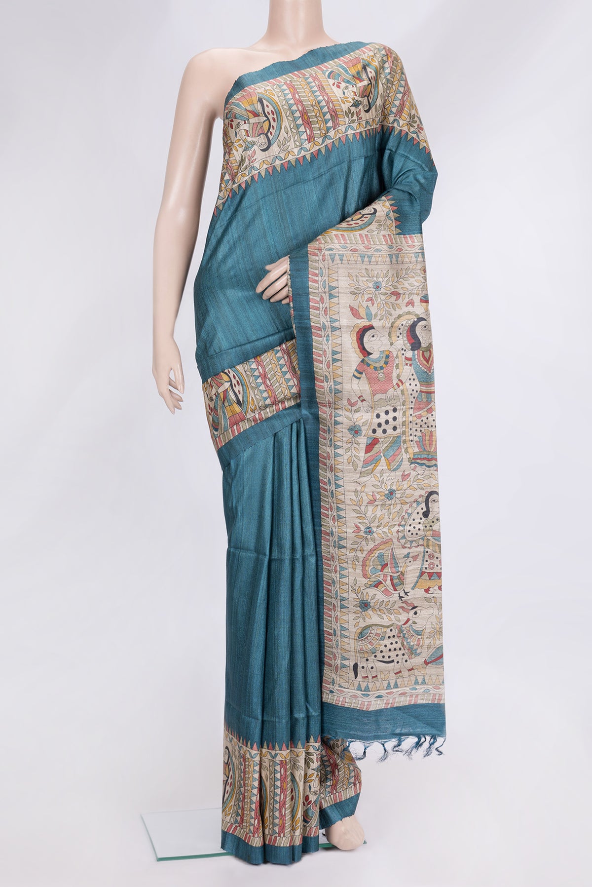 Sky Blue Dual Tone Tussar Silk Saree with Plain Body and Fancy Border.  displayed on a mannequin