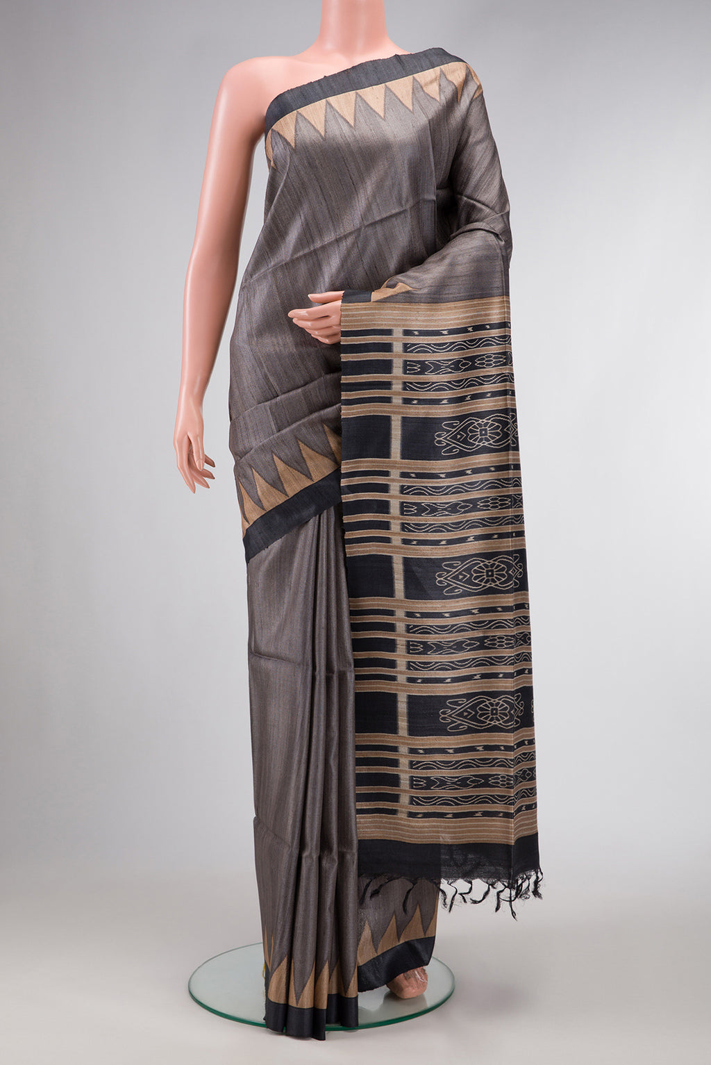 Grey Dual Tone Tussar Silk Saree with Plain Body and Temple Border.  displayed on a mannequin