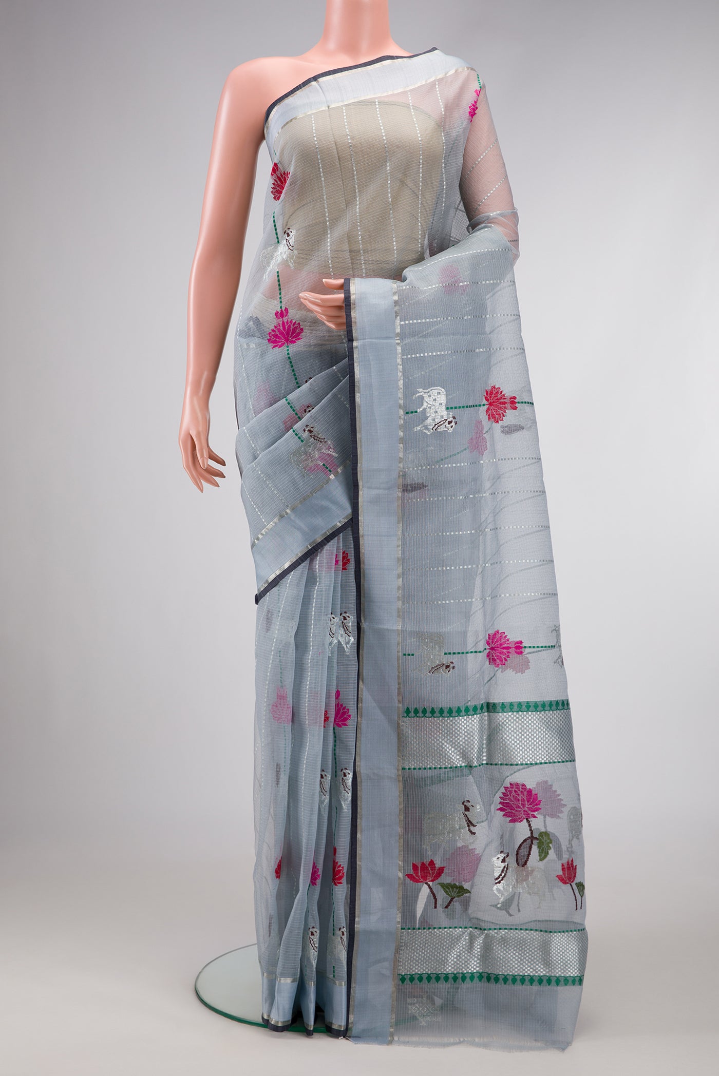 Grey Dual Tone Kota Silk Saree with Checked design on the body and Zari Border.  displayed on a mannequin
