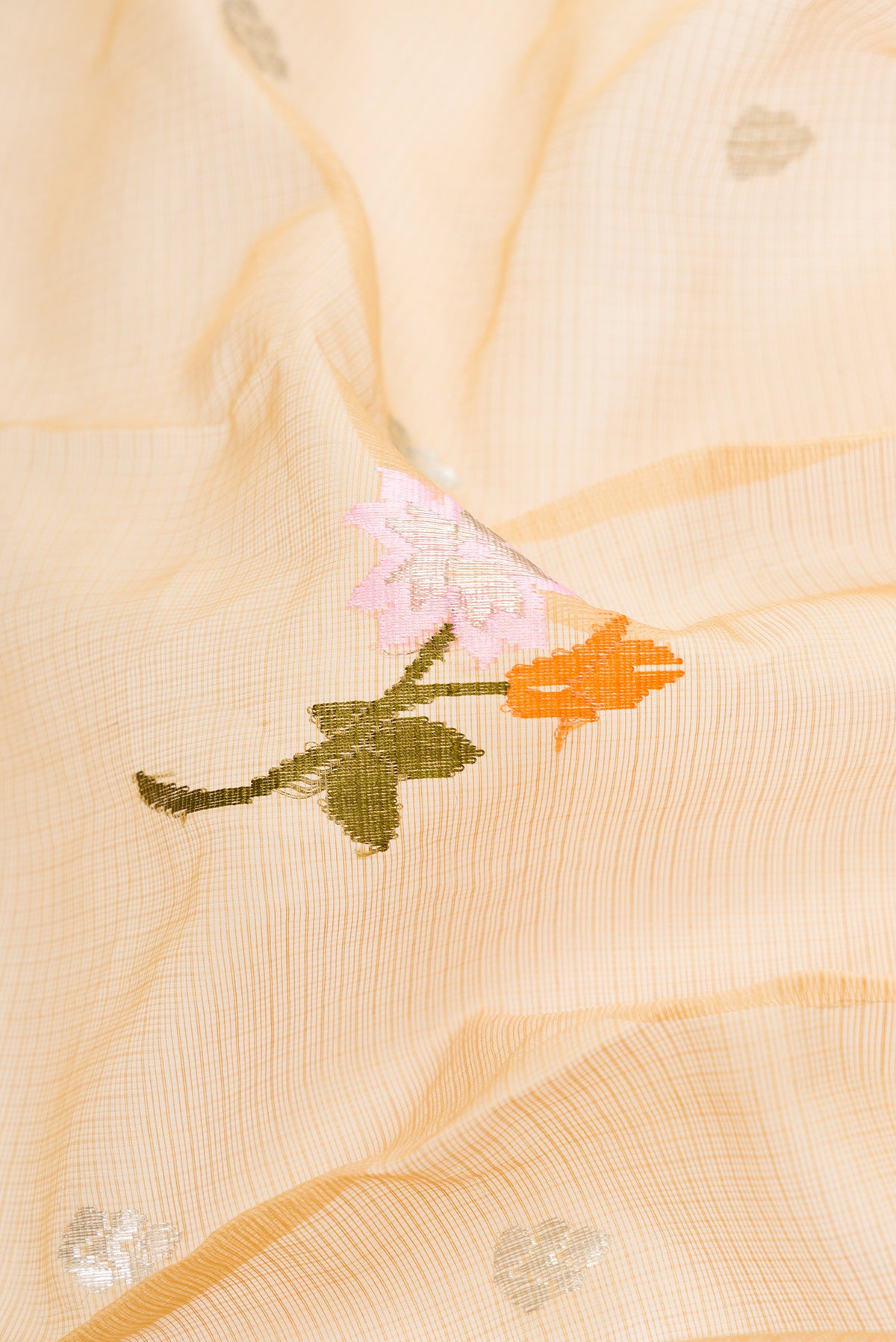 Close up of Sandal Dual Tone Kota Silk Saree with Zari And Thread Butta on the body and Zari Border.  displaying folds