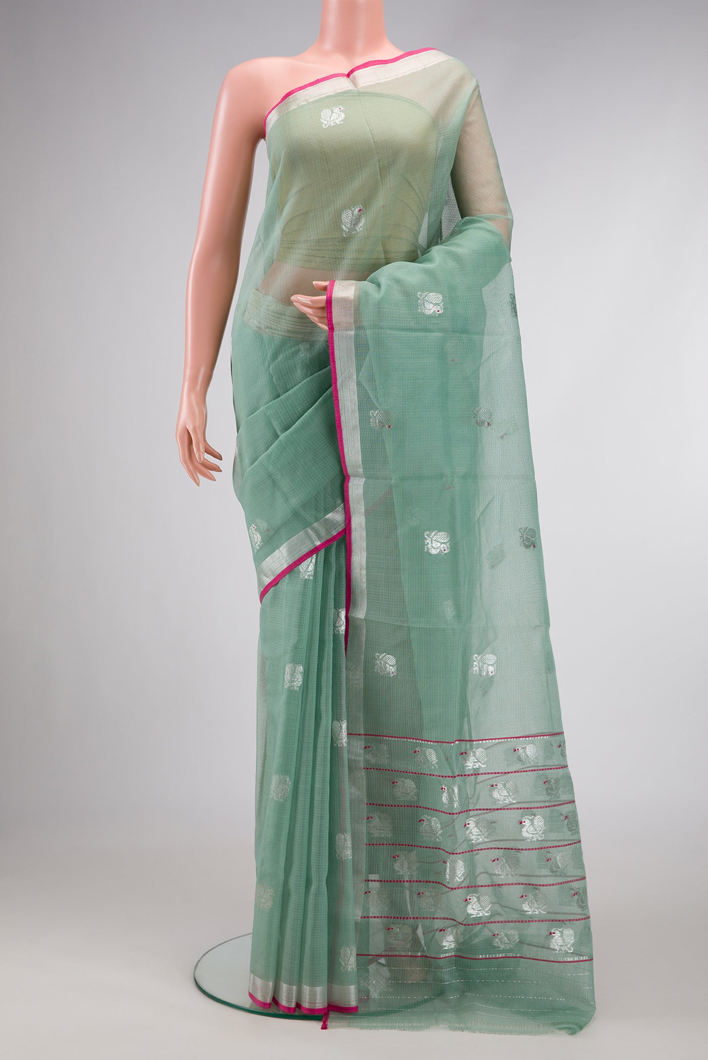 Sea Green Dual Tone Kota Silk Saree with Zari Butta on the body and Zari Border.  displayed on a mannequin