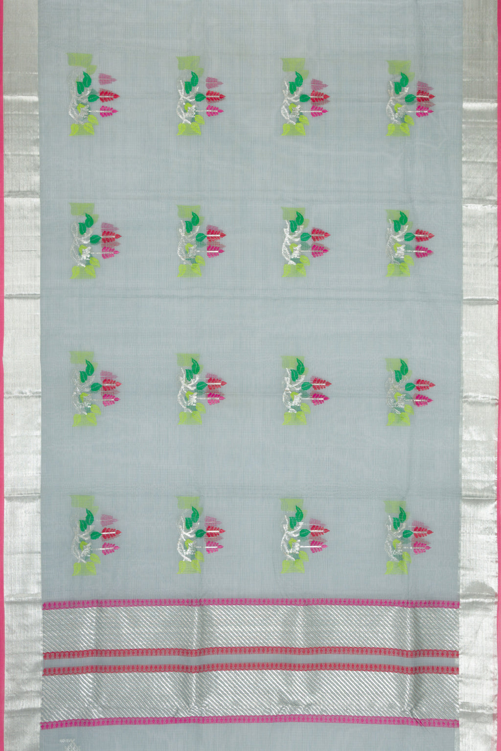 Flat view of Grey Dual Tone Kota Silk Saree with Zari And Thread Butta on the body and Zari Border. 
