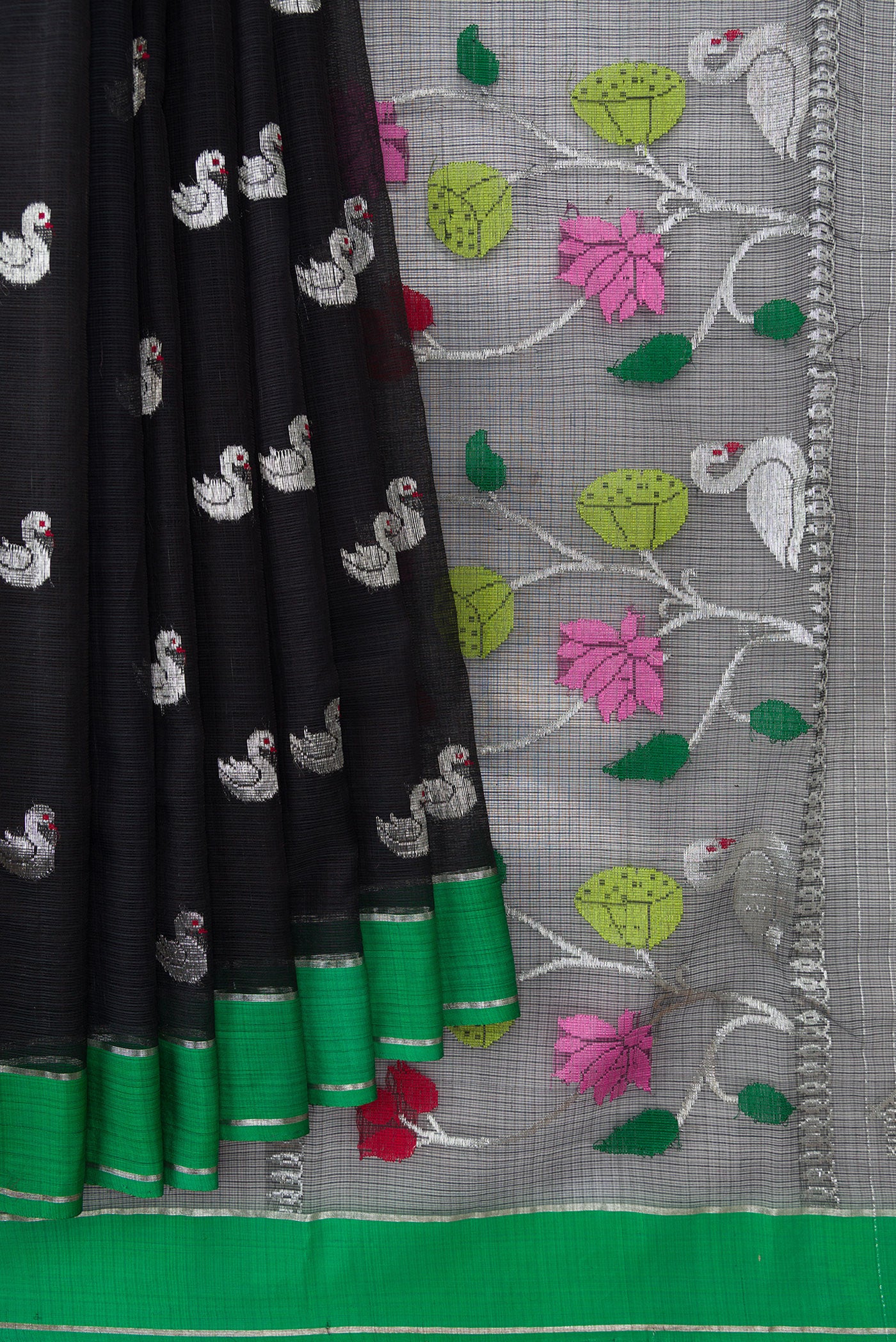 Pleats and pallu of Black Dual Tone Kota Silk Saree with Zari Butta on the body and Zari And Thread Border. 