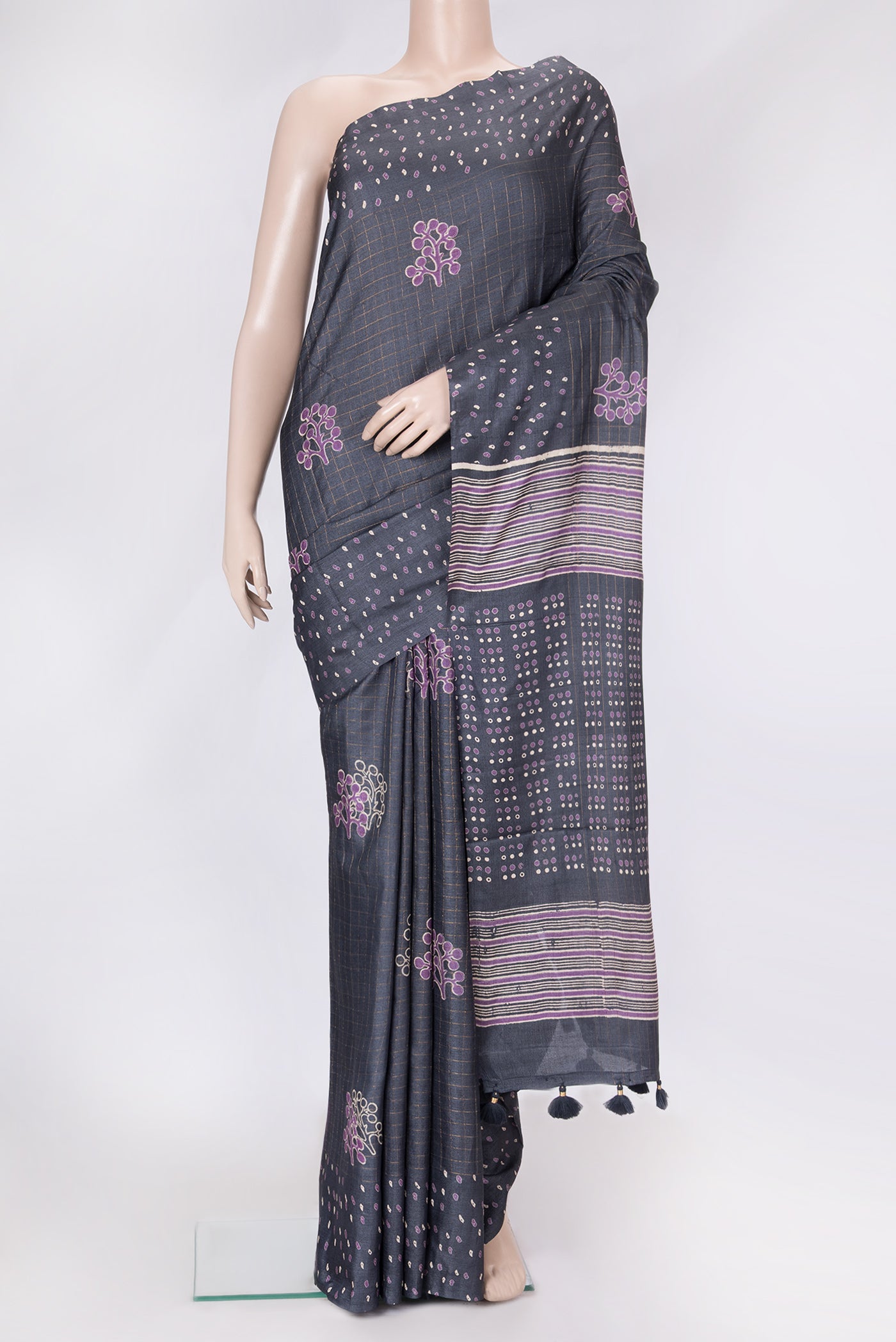 Grey Dual Tone Tussar Silk Saree with Checked design on the body and Printed Border.  displayed on a mannequin