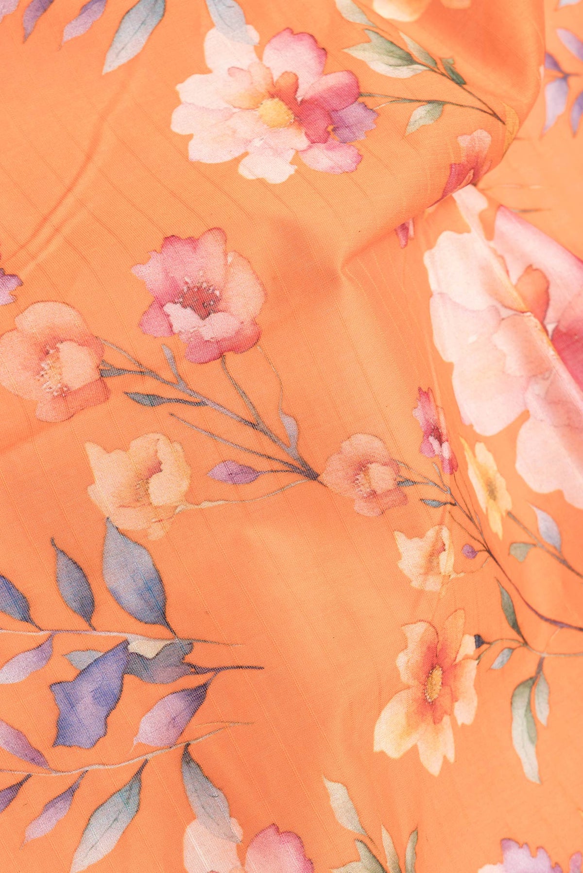 Close up of Orange Dual Tone Chanderi Silk Saree with Printed design on the body and Zari And Thread Border.  displaying folds