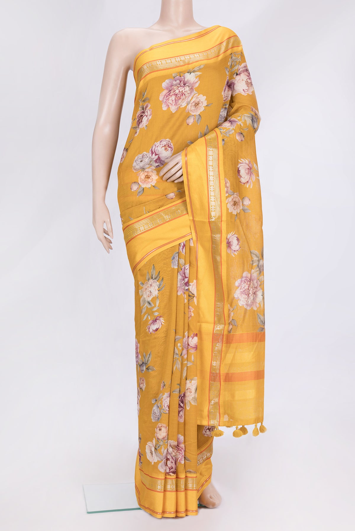 Mustard Dual Tone Chanderi Silk Saree with Printed design on the body and Zari And Thread Border.  displayed on a mannequin