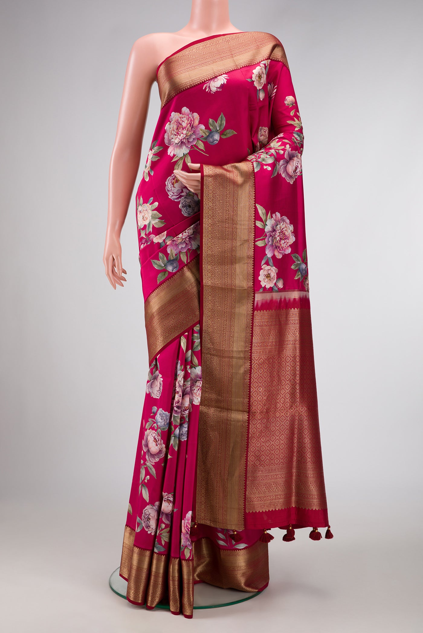 Dark Mauve Dual Tone Kanchipuram Silk Saree with Printed design on the body and Zari Border.  displayed on a mannequin