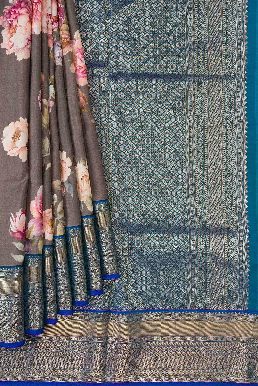 Pleats and pallu of Grey Dual Tone Kanchipuram Silk Saree with Printed design on the body and Zari Border. 