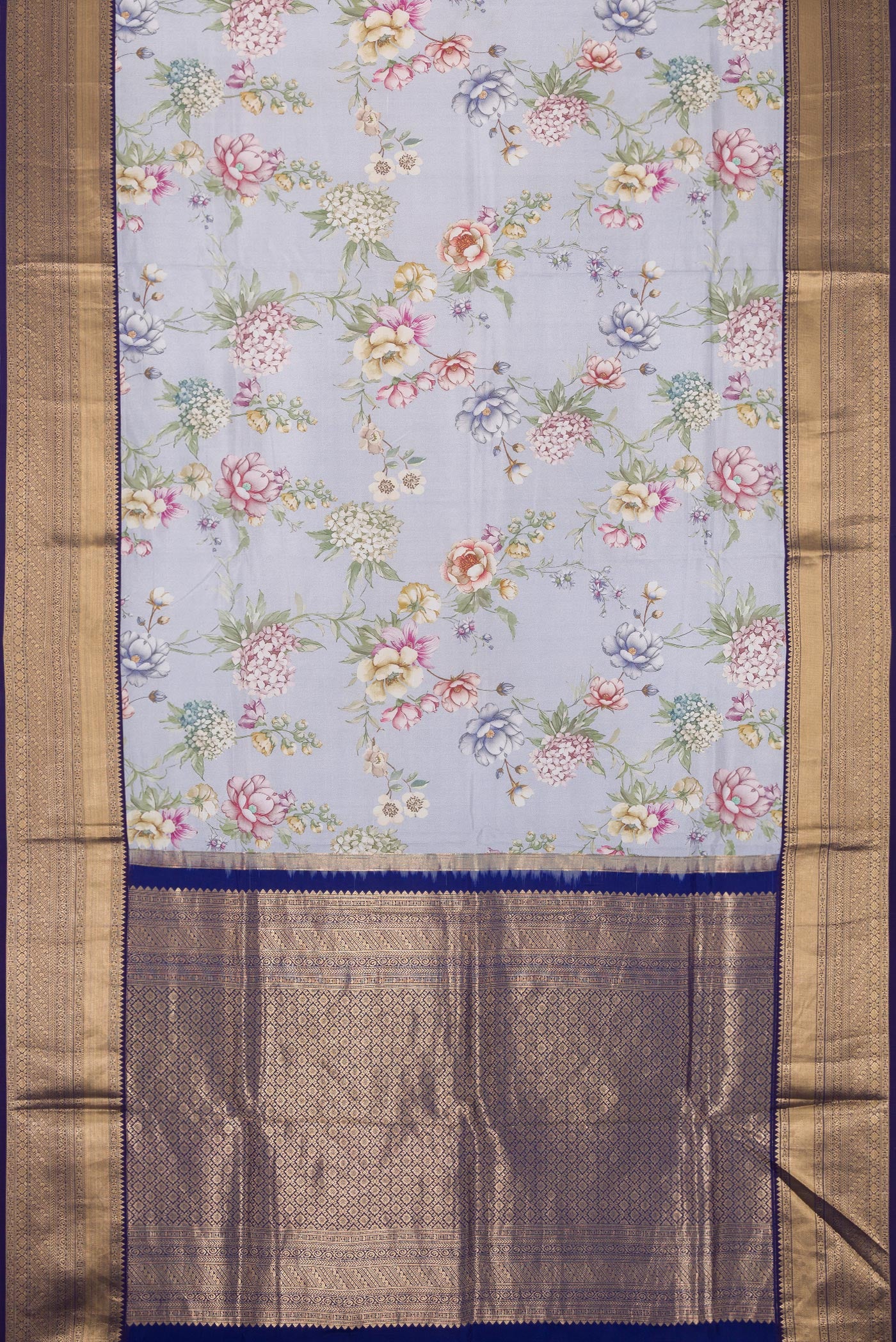 Flat view of Light Blue Dual Tone Kanchipuram Silk Saree with Printed design on the body and Zari Border. 
