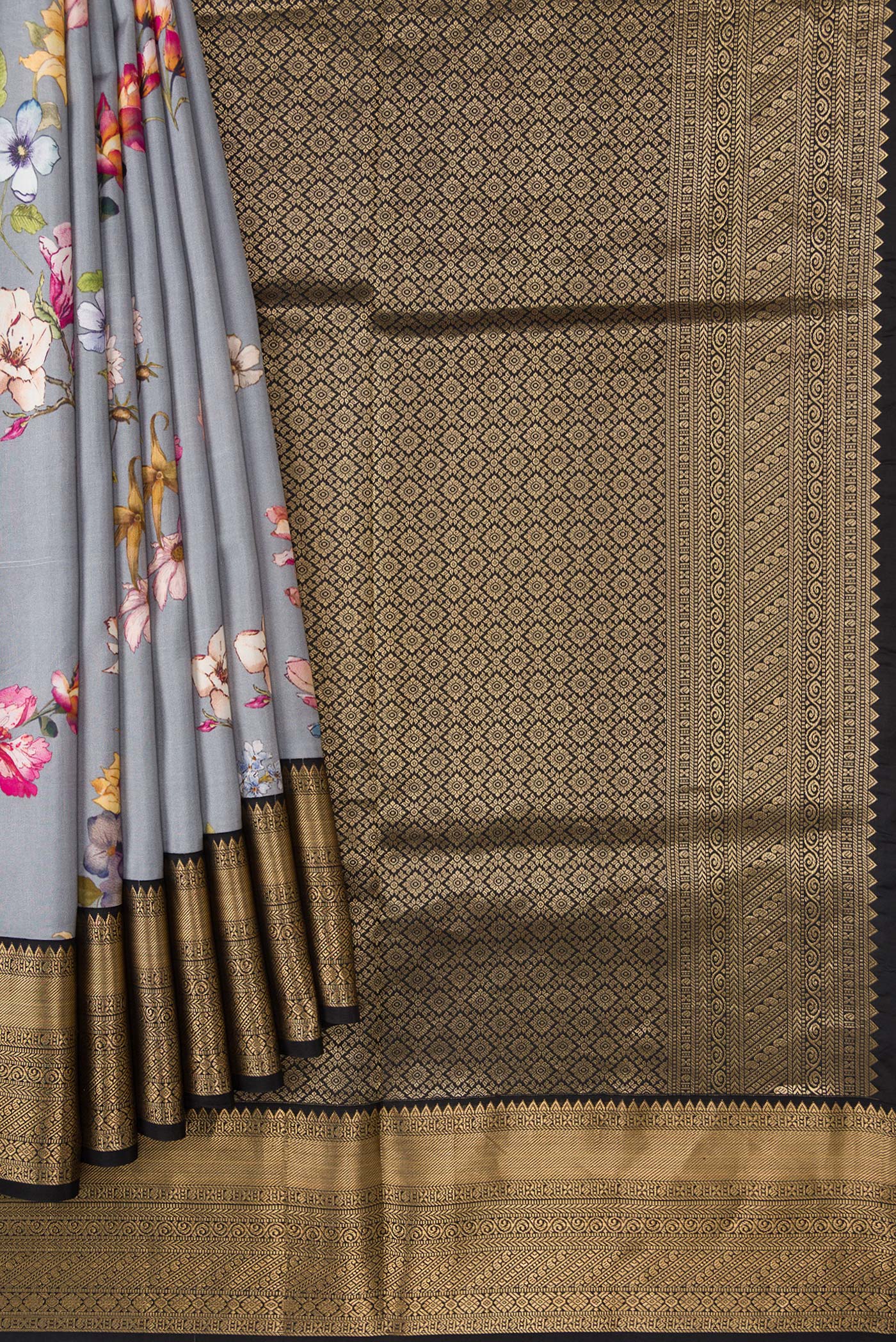 Pleats and pallu of Grey Dual Tone Kanchipuram Silk Saree with Printed design on the body and Zari Border. 