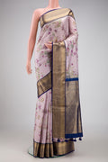 Lilac Dual Tone Kanchipuram Silk Saree with Printed design on the body and Zari Border.  displayed on a mannequin