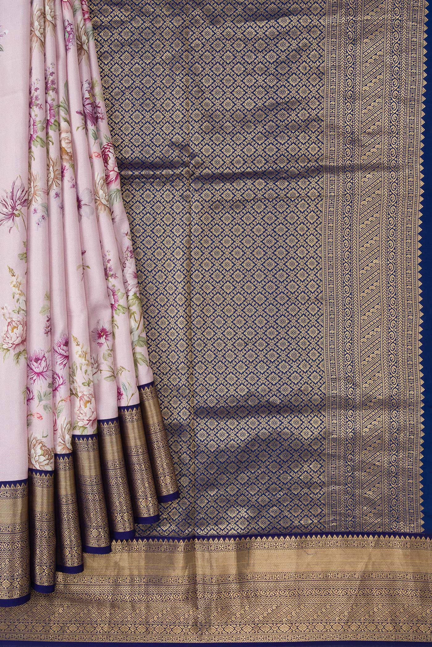 Pleats and pallu of Lilac Dual Tone Kanchipuram Silk Saree with Printed design on the body and Zari Border. 