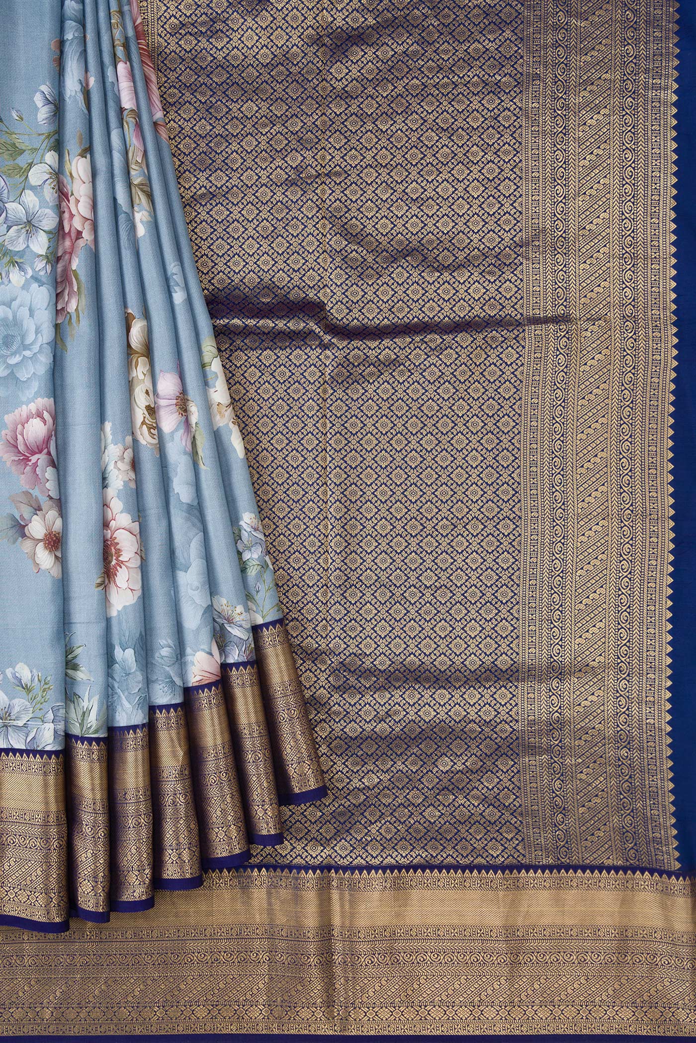 Pleats and pallu of Grey Dual Tone Kanchipuram Silk Saree with Printed design on the body and Zari Border. 