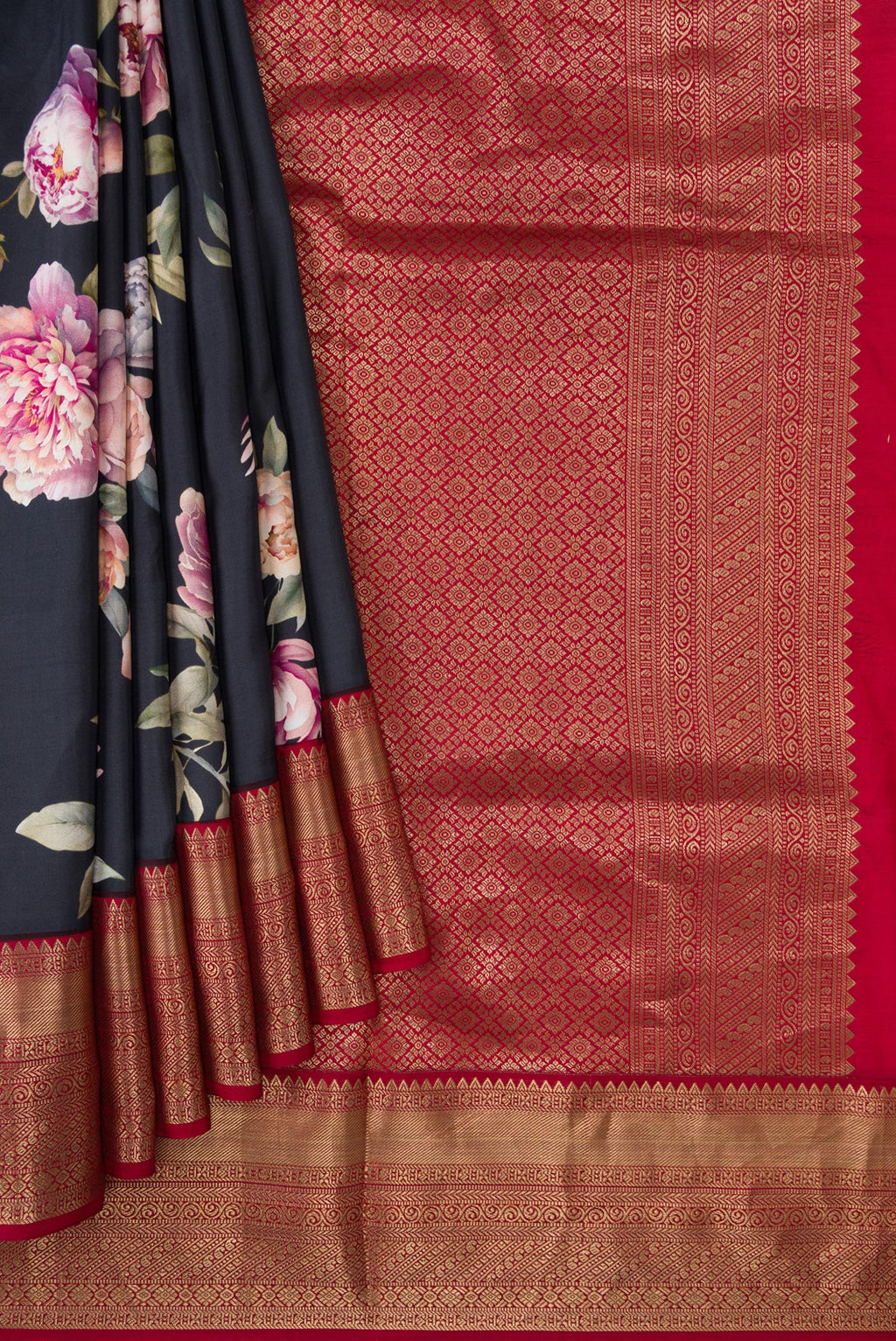 Pleats and pallu of Navy Blue Dual Tone Kanchipuram Silk Saree with Printed design on the body and Zari Border. 