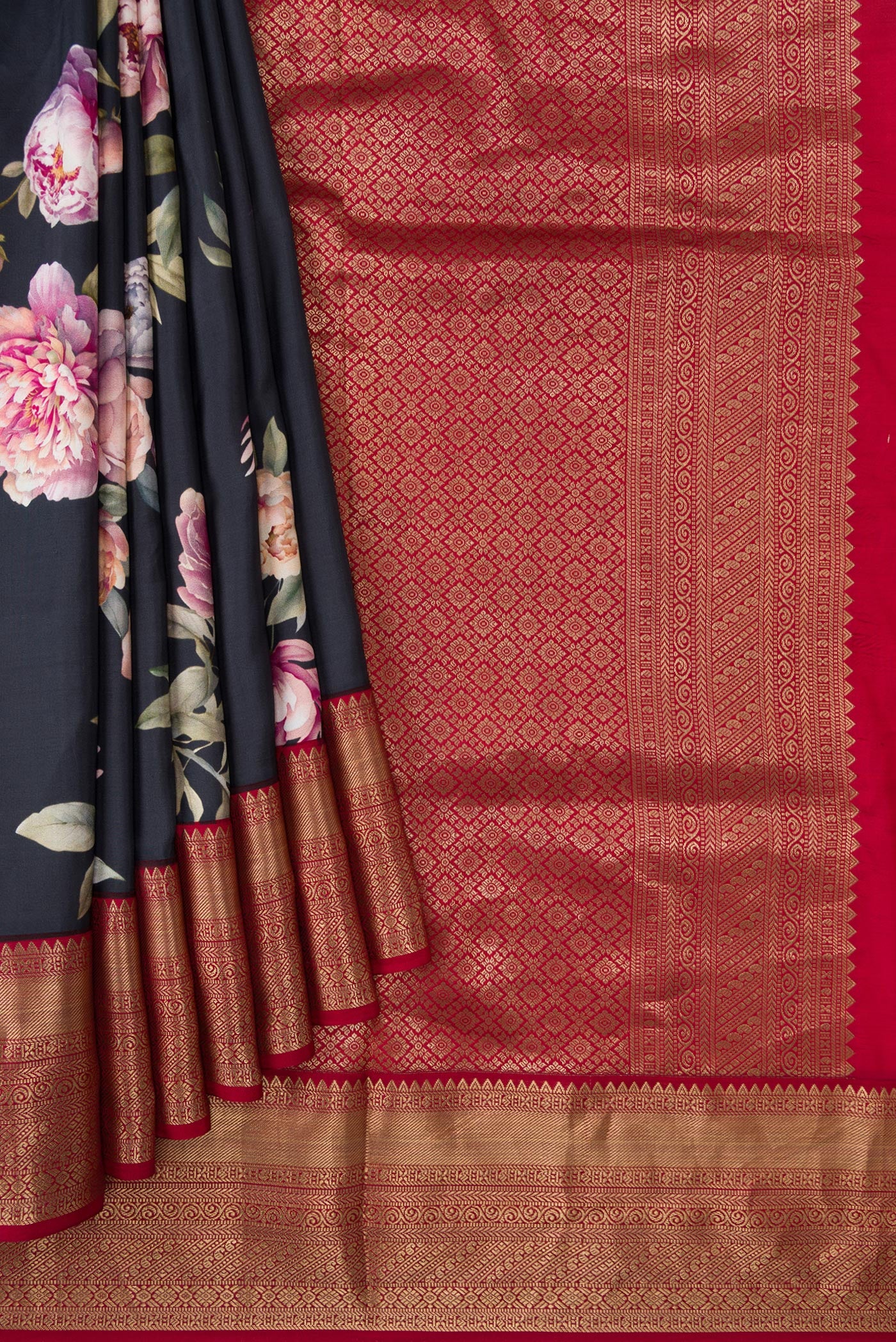 Pleats and pallu of Navy Blue Dual Tone Kanchipuram Silk Saree with Printed design on the body and Zari Border. 