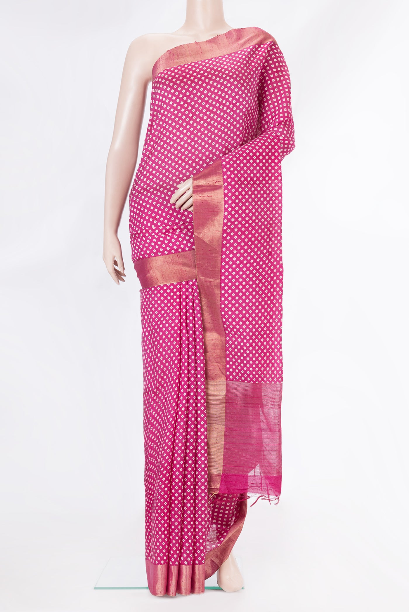 Pink Dual Tone Tussar Silk Saree with Bandhani Print on the body and Zari Border.  displayed on a mannequin