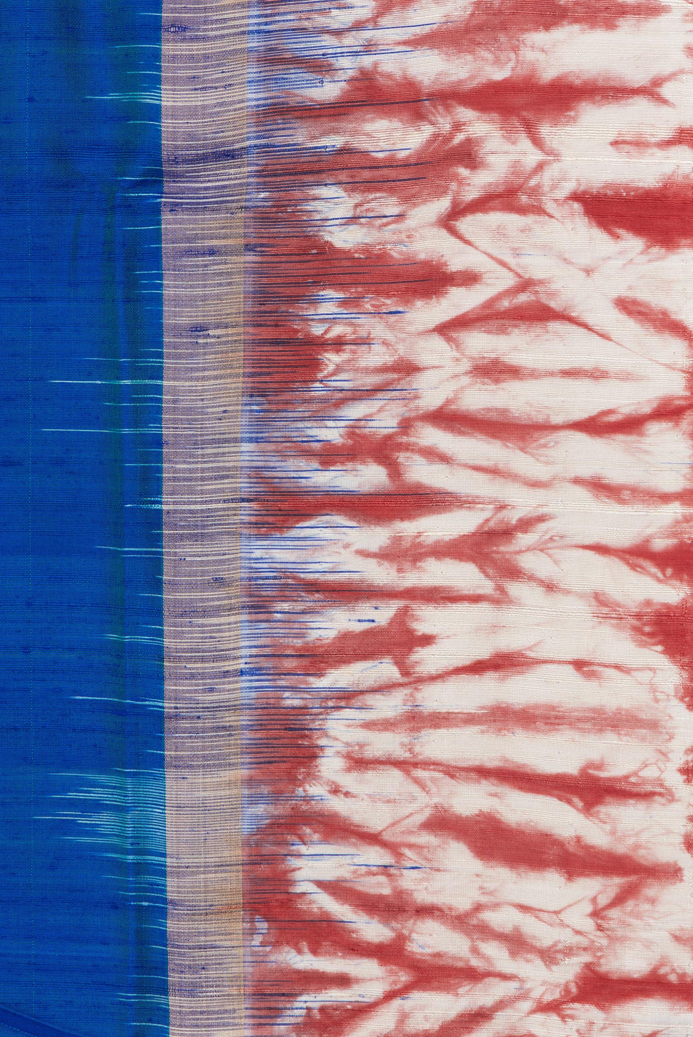 Border image of Peacock Blue Dual Tone Tussar Silk Saree with Plain Body and Printed Border. 