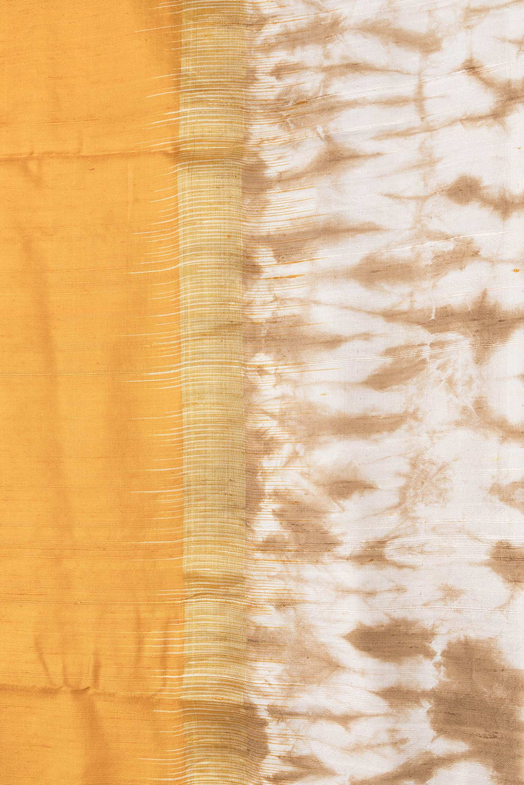 Border image of Mustard Dual Tone Tussar Silk Saree with Plain Body and Printed Border. 