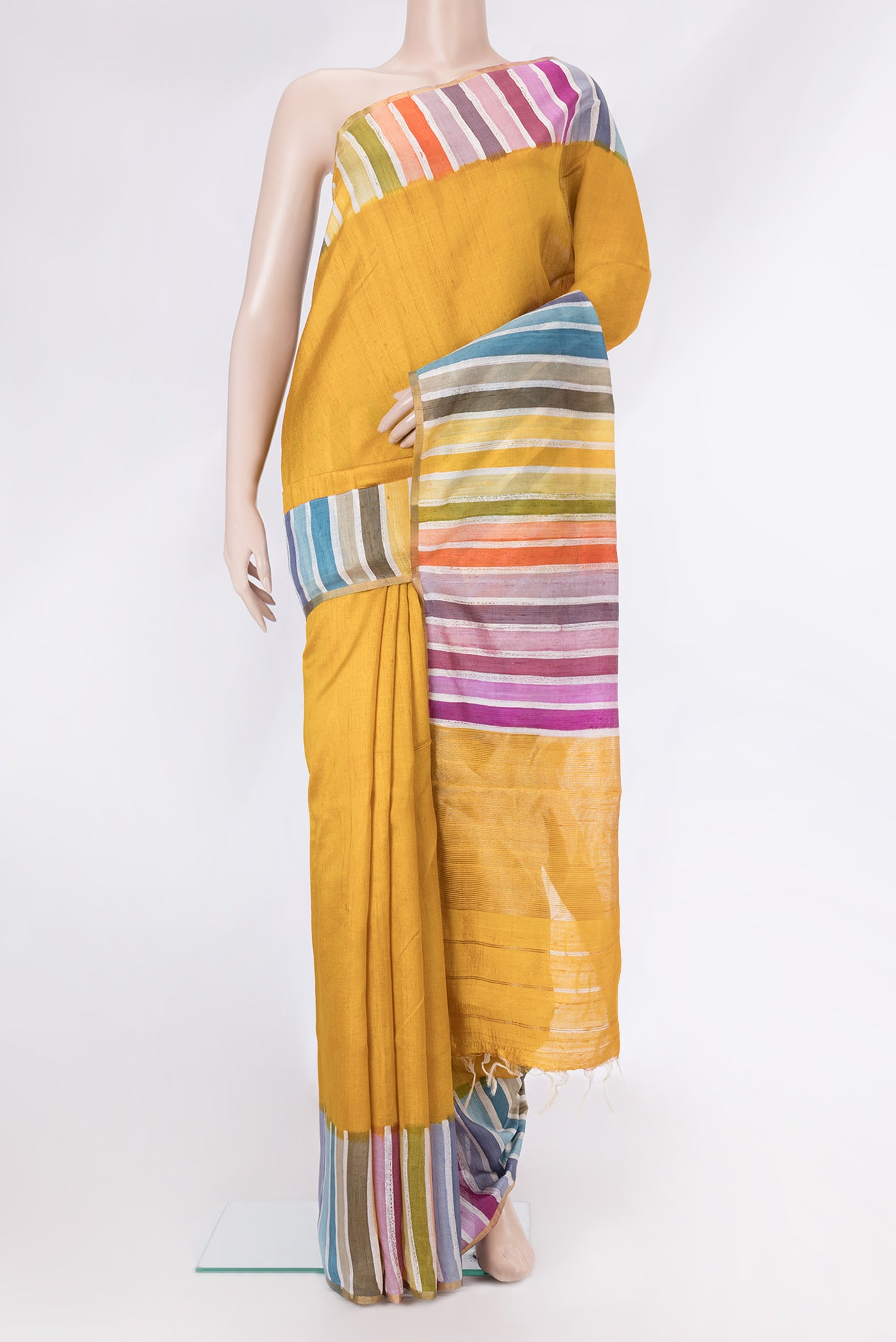 Yellow Tussar Silk Saree with Plain Body and Fancy Border.  displayed on a mannequin