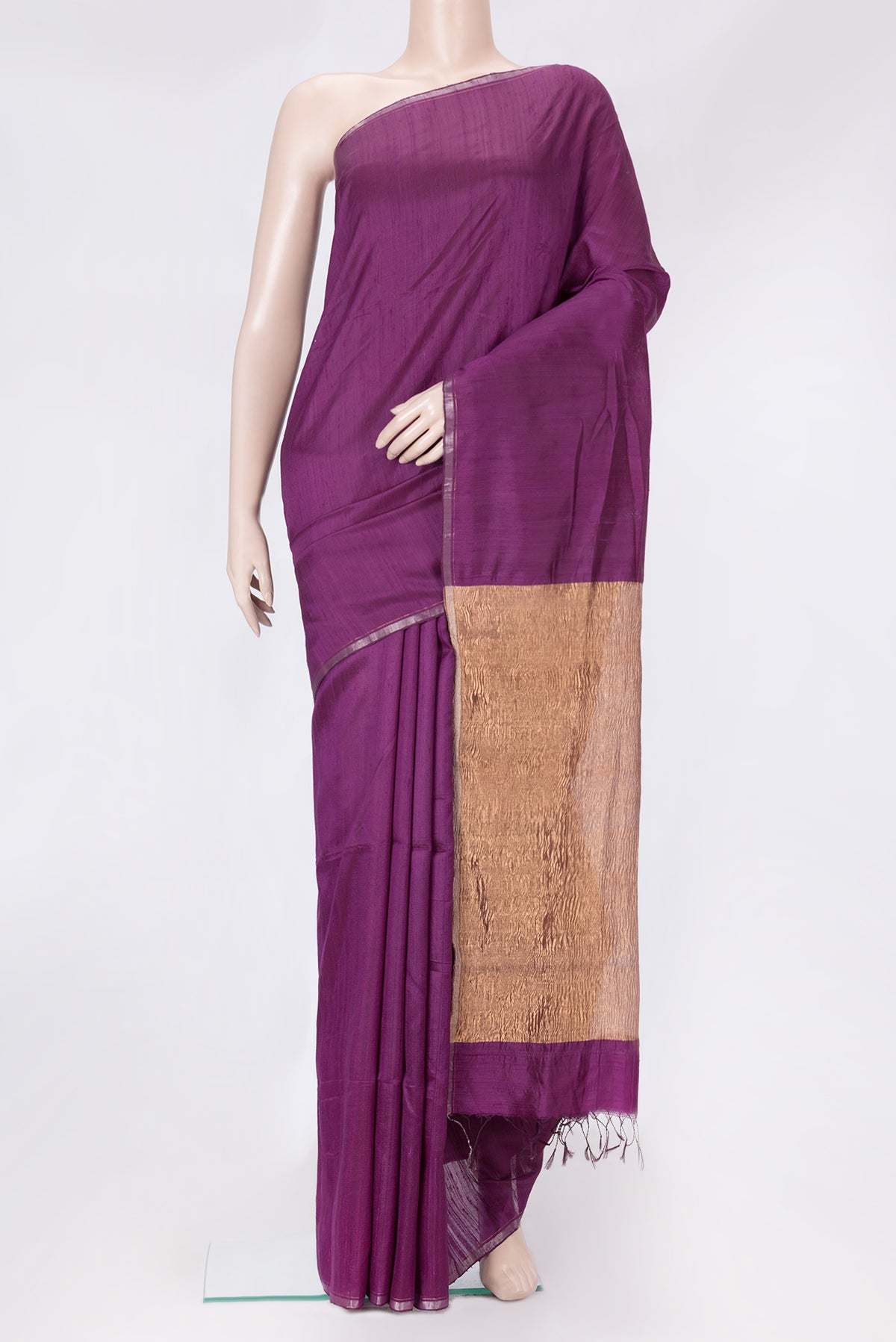 Violet Dual Tone Raw Silk Saree with Plain Body and Thin Zari Line.  displayed on a mannequin
