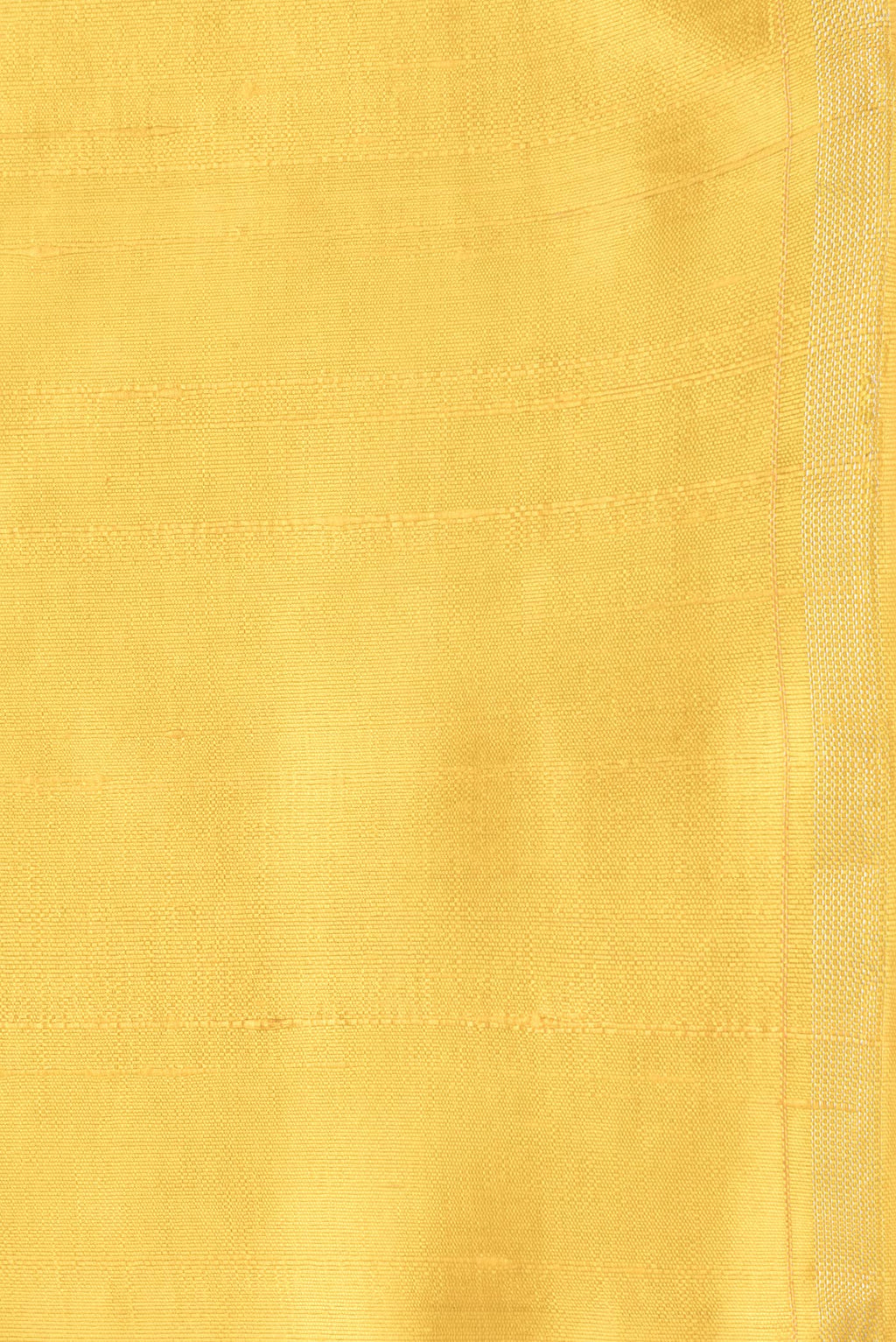 Border image of Yellow Dual Tone Raw Silk Saree with Plain Body and Thin Zari Line. 