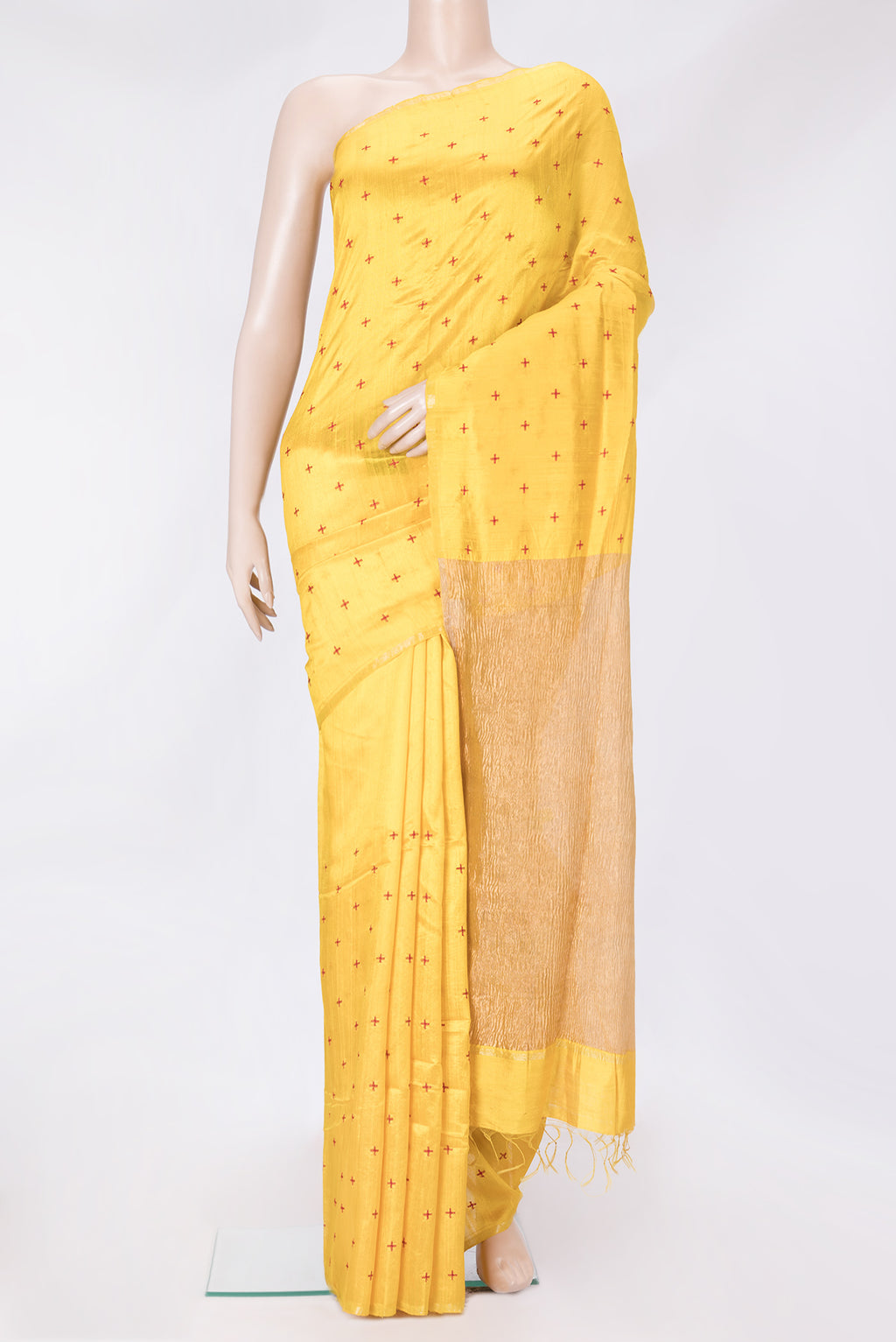 Yellow Dual Tone Raw Silk Saree with Thread Butta on the body and Thin Zari Line.  displayed on a mannequin