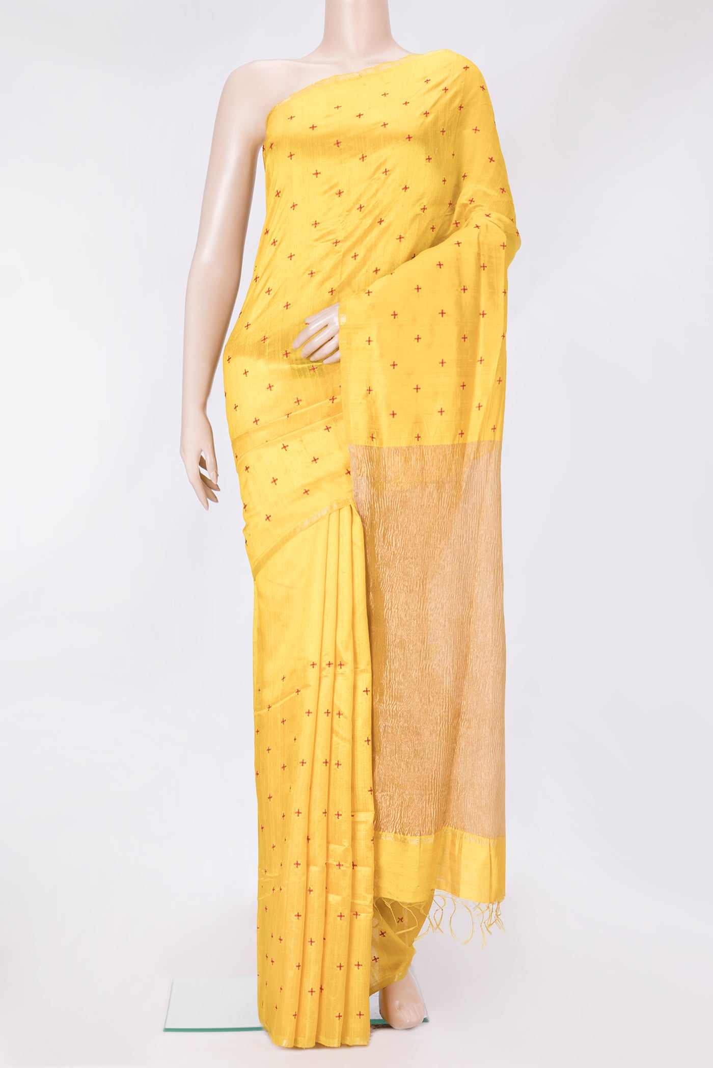 Yellow Dual Tone Raw Silk Saree with Thread Butta on the body and Thin Zari Line.  displayed on a mannequin