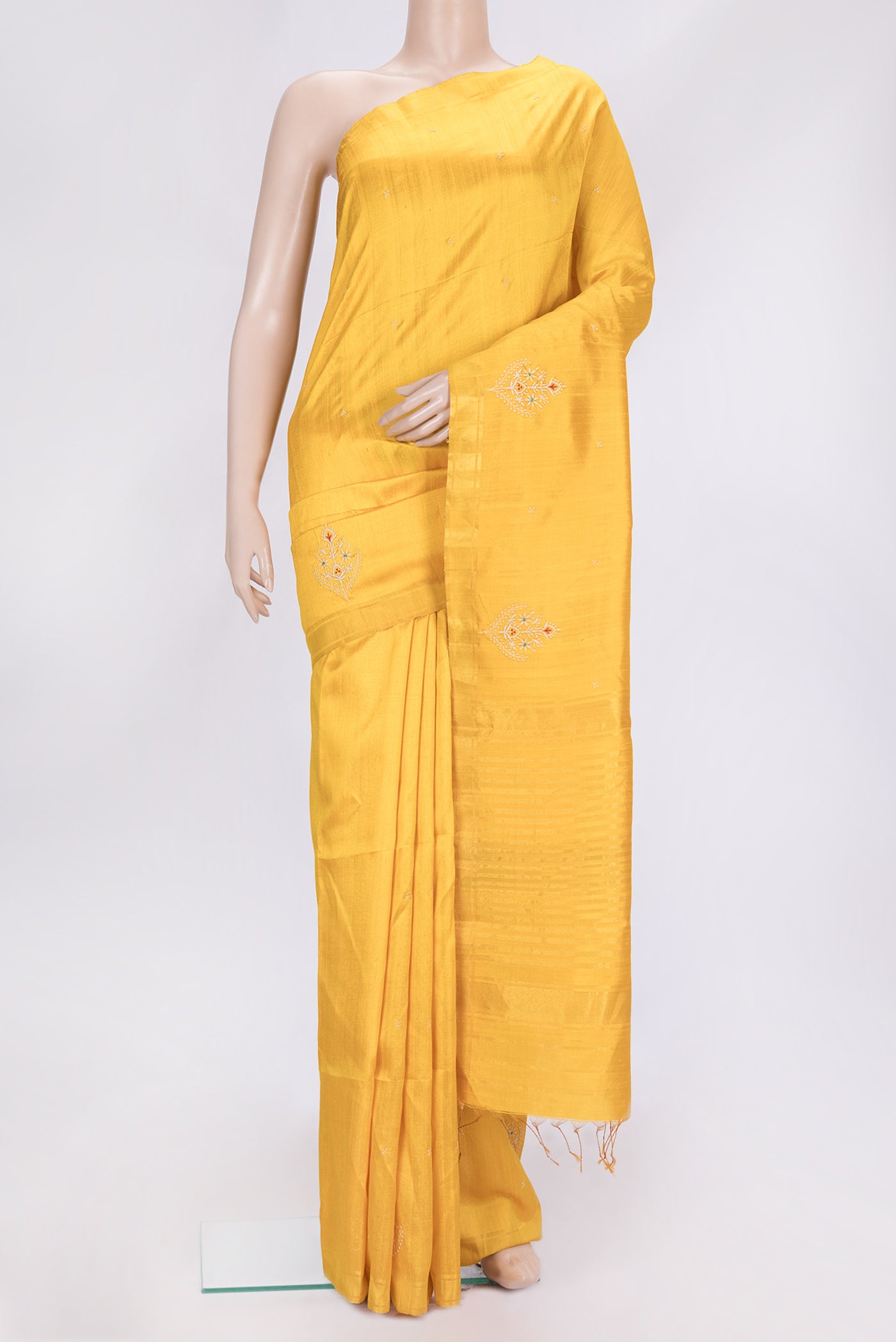 Yellow Dual Tone Raw Silk Saree with Embroidery on the body and Zari Border.  displayed on a mannequin