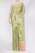 Pista Green Tussar Silk Saree with Printed design on the body and Plain Border.  displayed on a mannequin
