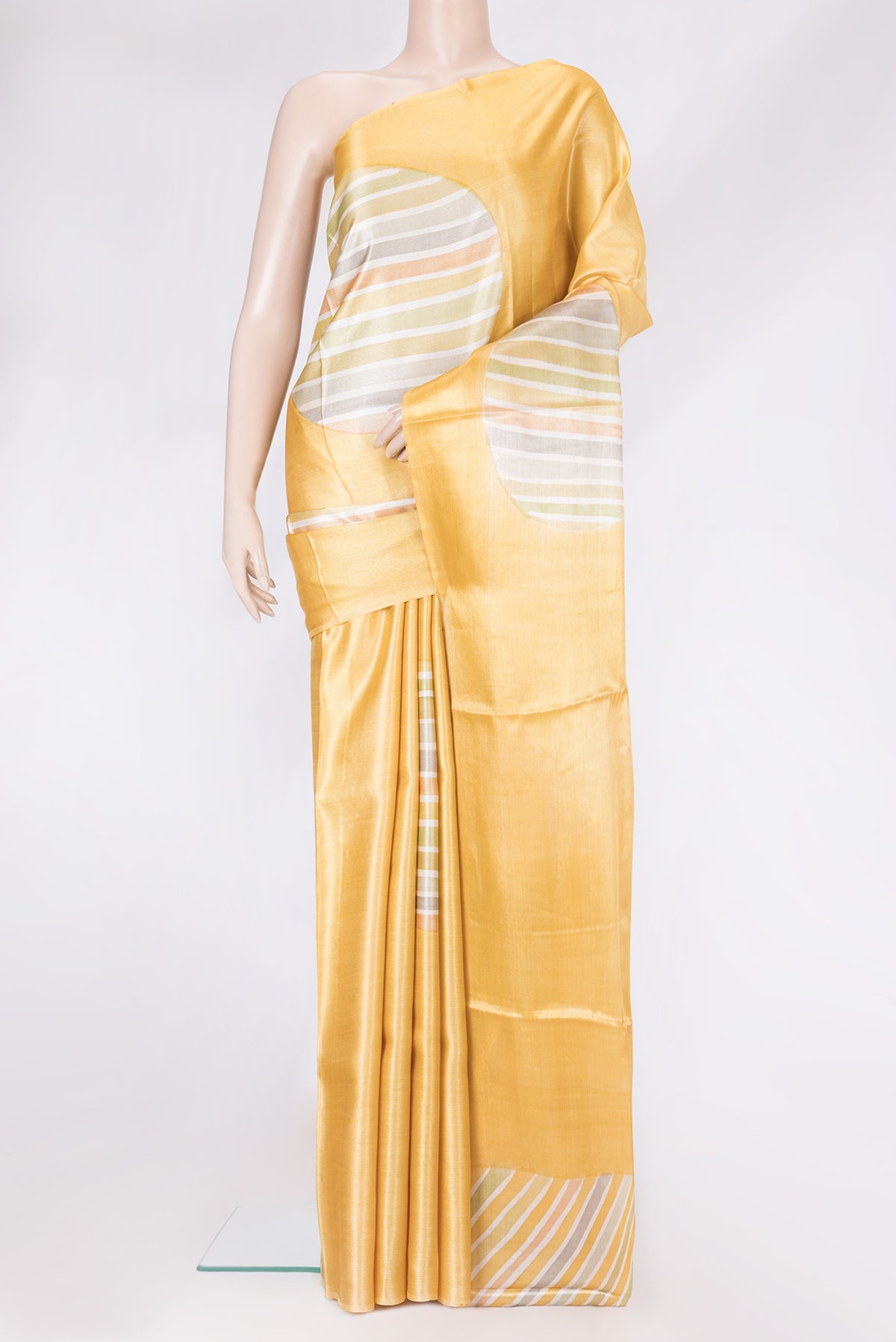 Sandal Tussar Silk Saree with Printed design on the body and Without Border.  displayed on a mannequin