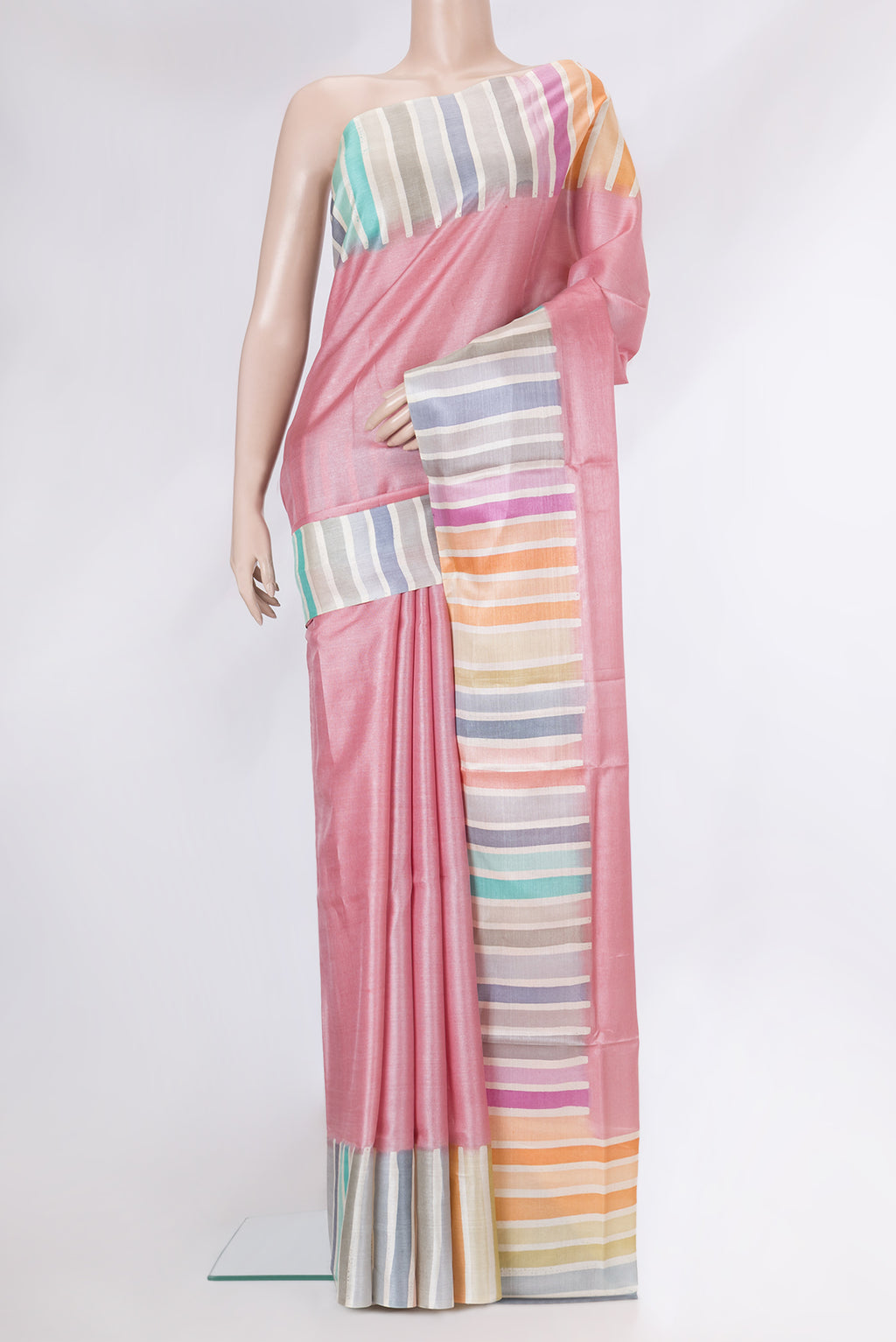 Rose pink Tussar Silk Saree with Plain Body and Fancy Border.  displayed on a mannequin