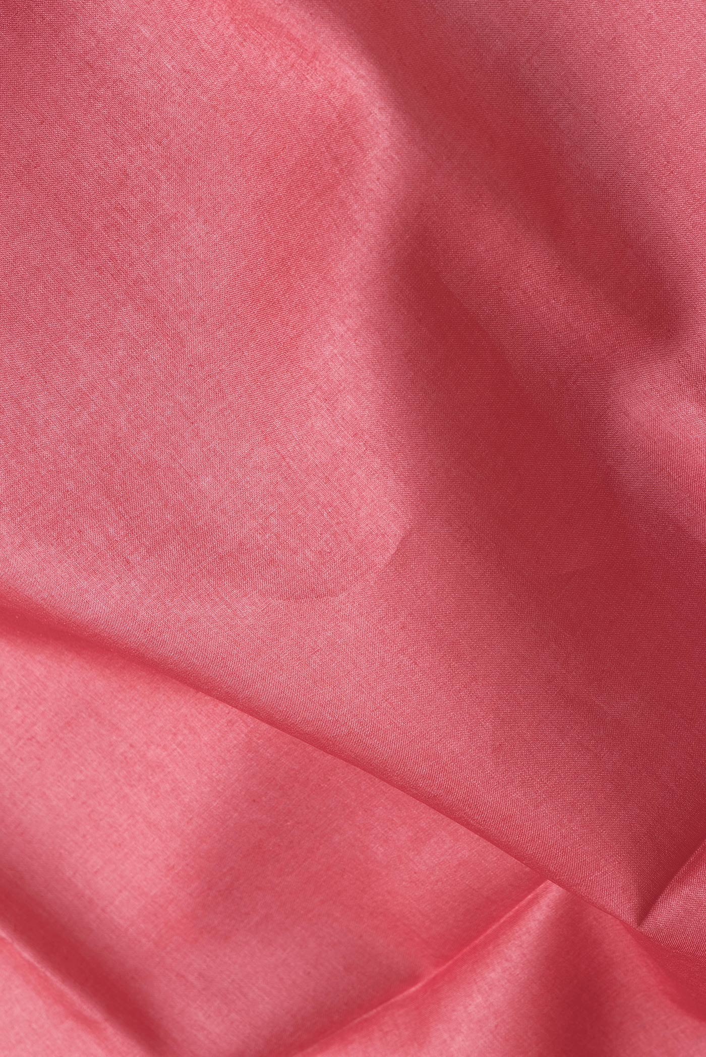 Close up of Pink Dual Tone Tussar Silk Saree with Plain Body and Printed Border.  displaying folds