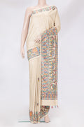 Beige Tussar Silk Saree with Printed design on the body and Printed Border.  displayed on a mannequin