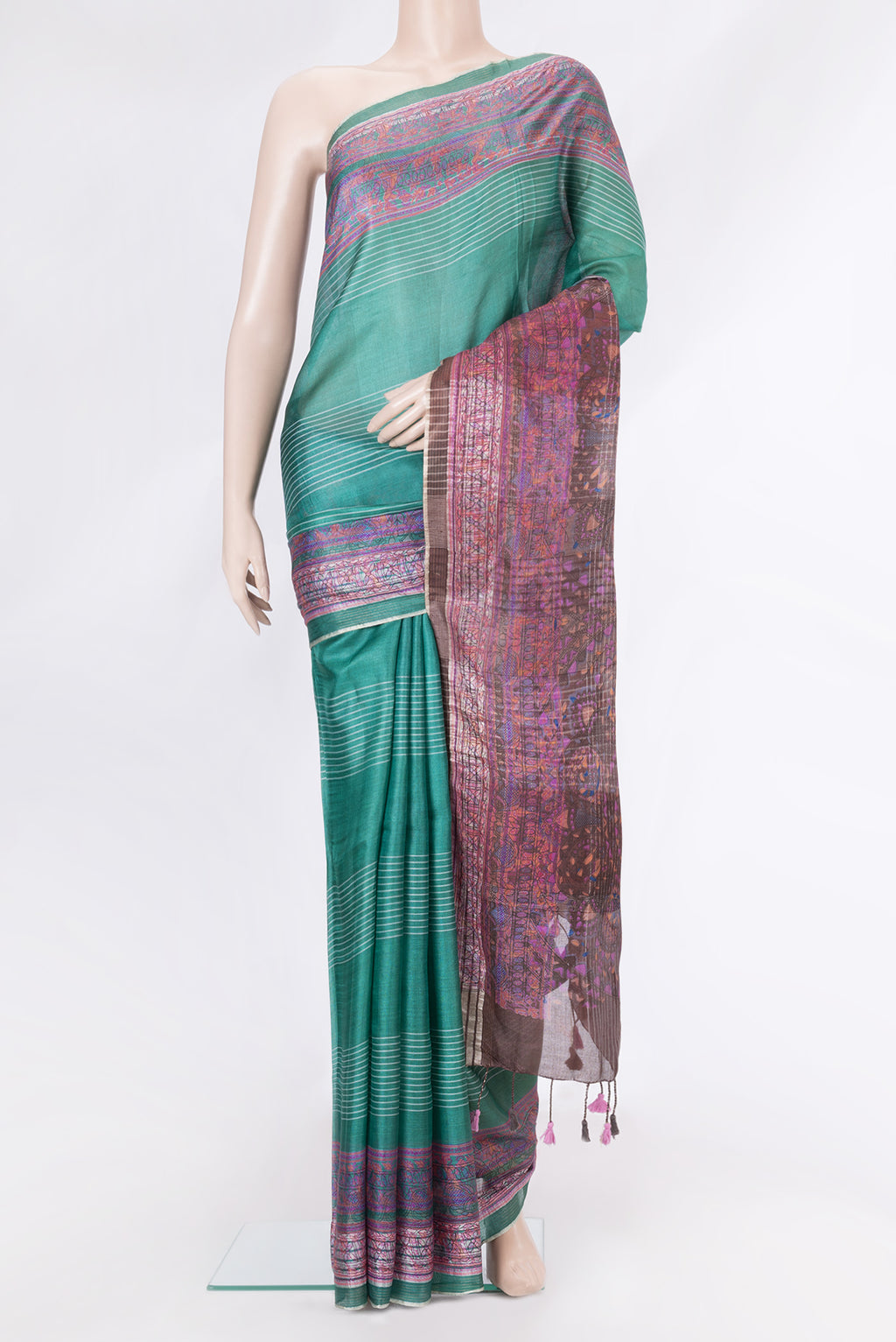Green Tussar Silk Saree with Stripes on the body and Printed Border.  displayed on a mannequin
