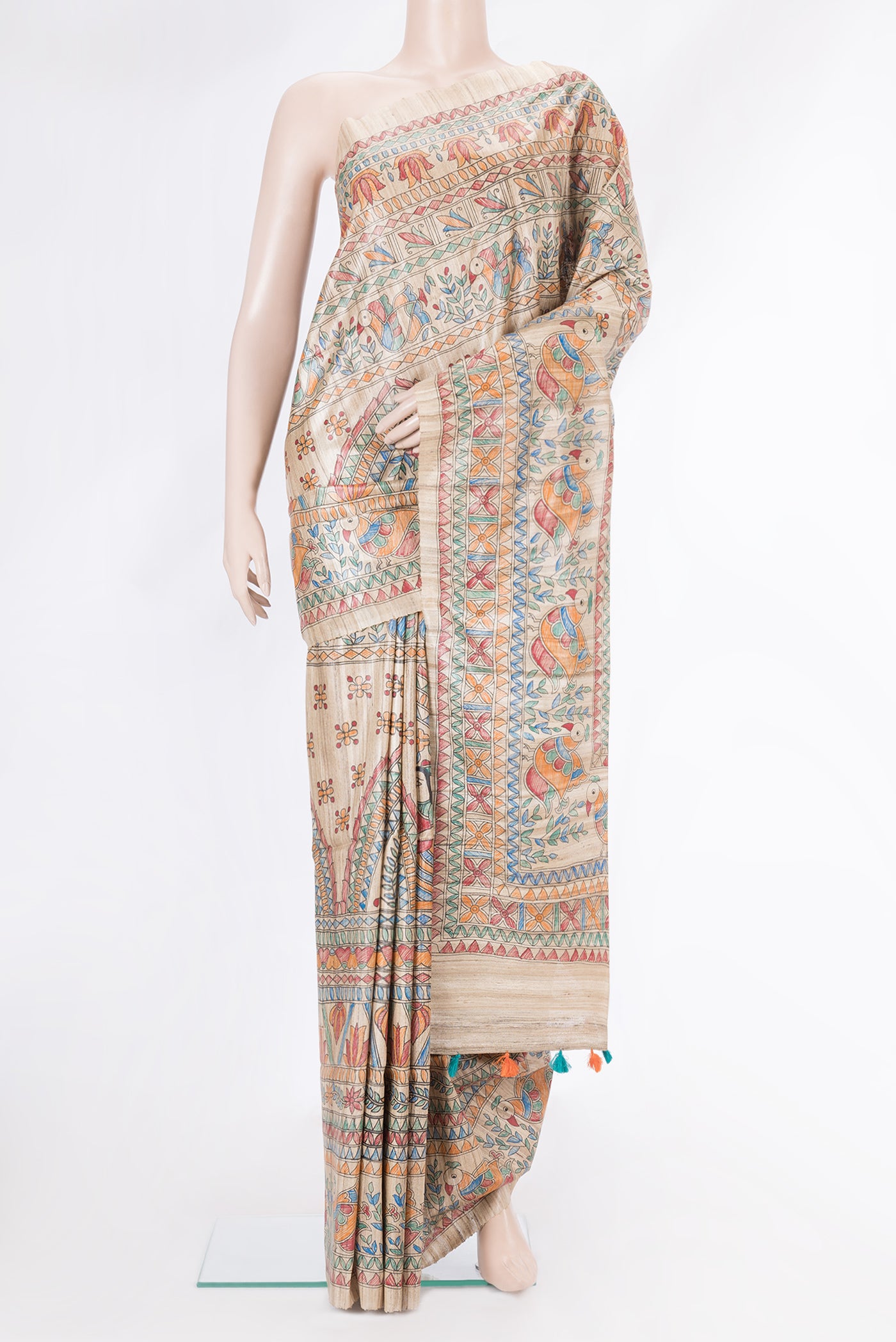 Beige Dual Tone Tussar Silk Saree with Printed design on the body and Fancy Border.  displayed on a mannequin