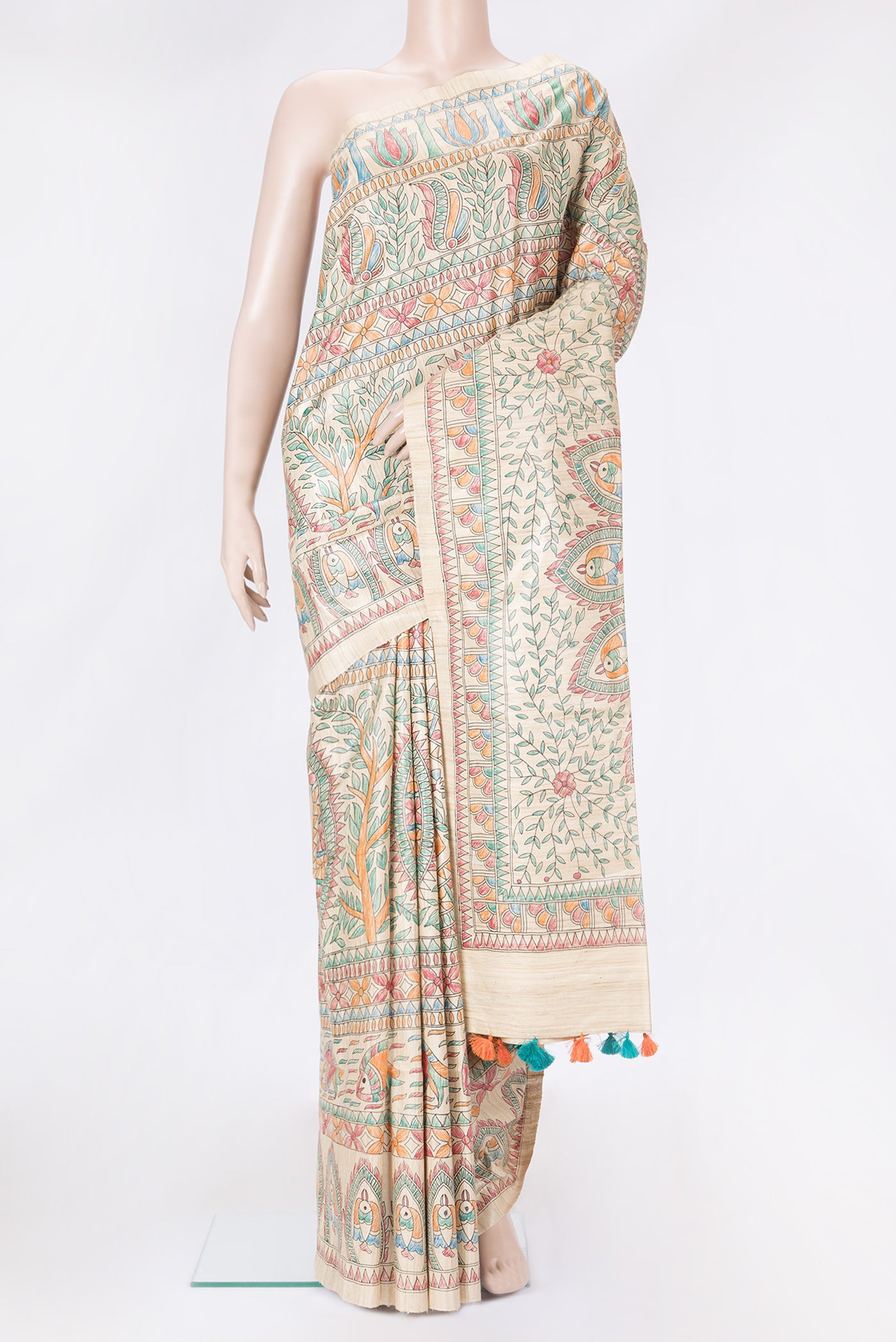 Beige Dual Tone Tussar Silk Saree with Printed design on the body and Fancy Border.  displayed on a mannequin