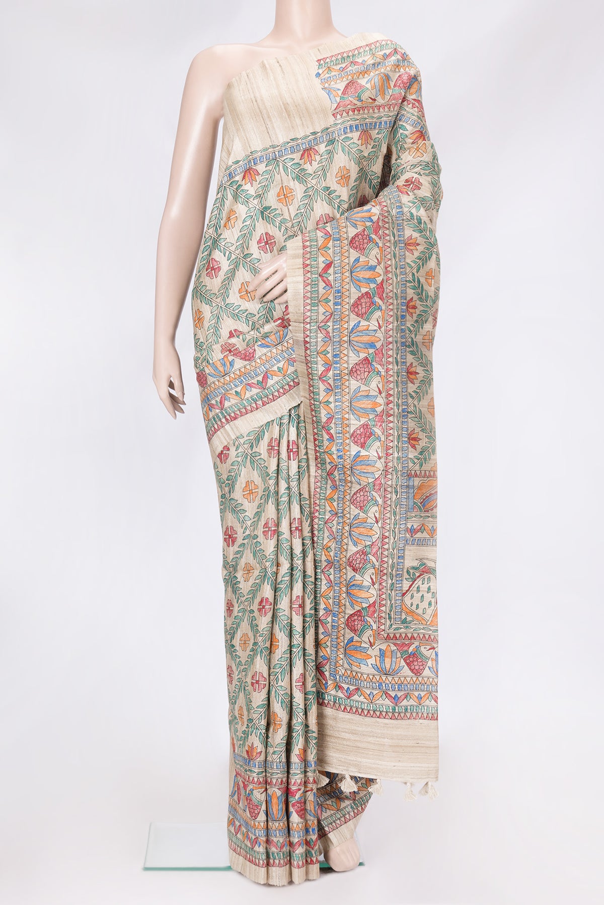 Beige Dual Tone Tussar Silk Saree with Printed design on the body and Printed Border.  displayed on a mannequin