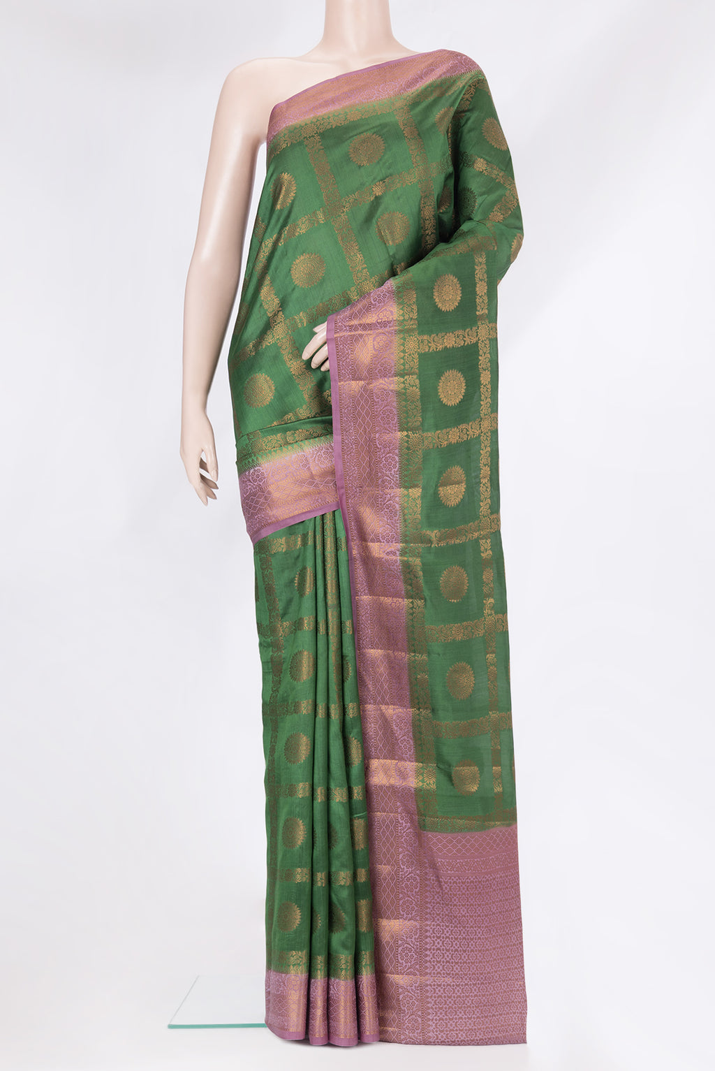 Green Tussar Silk Saree with Checked design on the body and Thread Border.  displayed on a mannequin