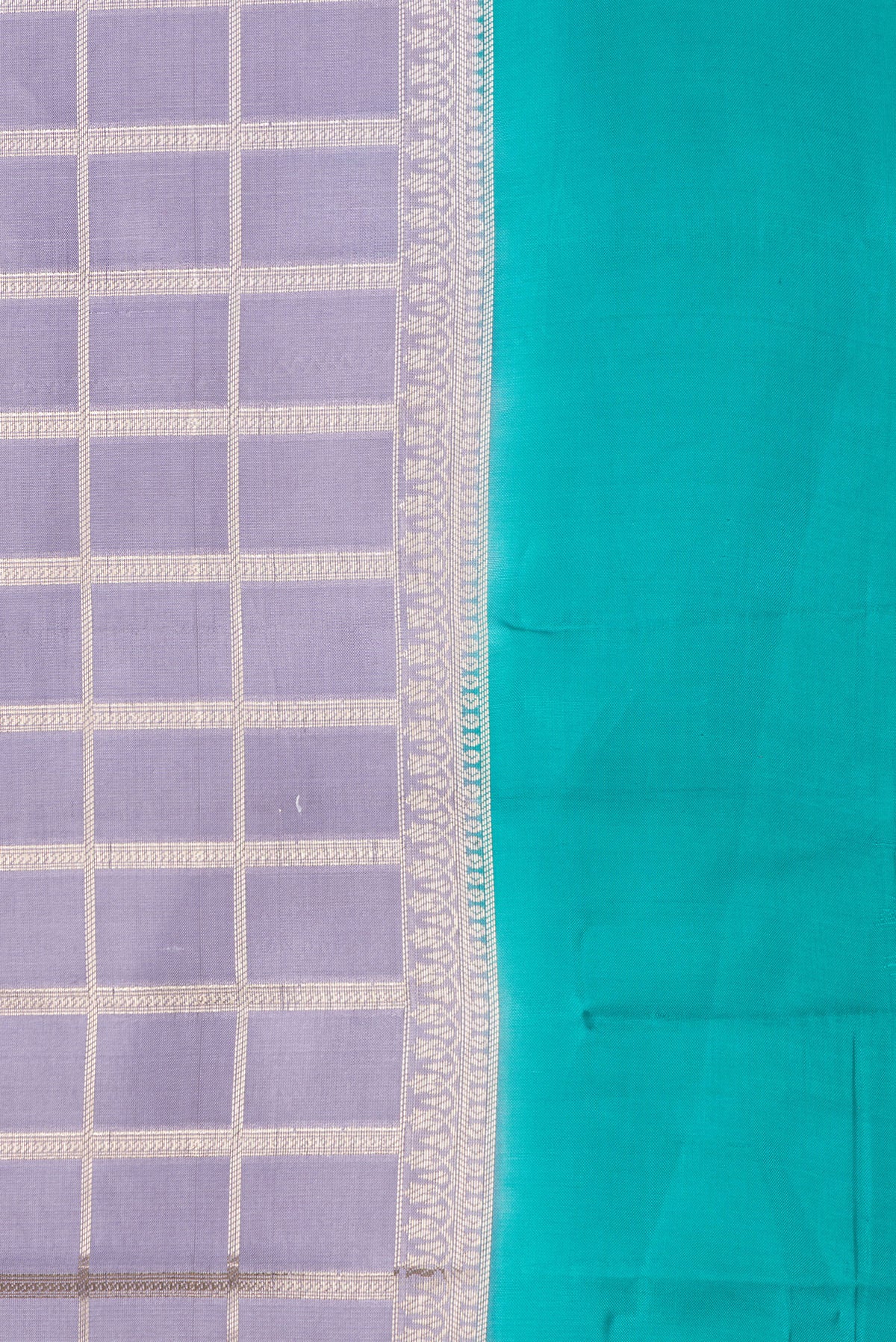 Border image of Grey Dual Tone Tussar Silk Saree with Checked design on the body and Zari Border. 