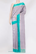 Grey Dual Tone Tussar Silk Saree with Checked design on the body and Zari Border.  displayed on a mannequin