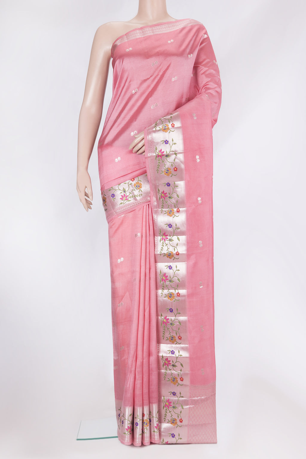 Pink Tussar Silk Saree with Zari Butta on the body and Fancy Border.  displayed on a mannequin