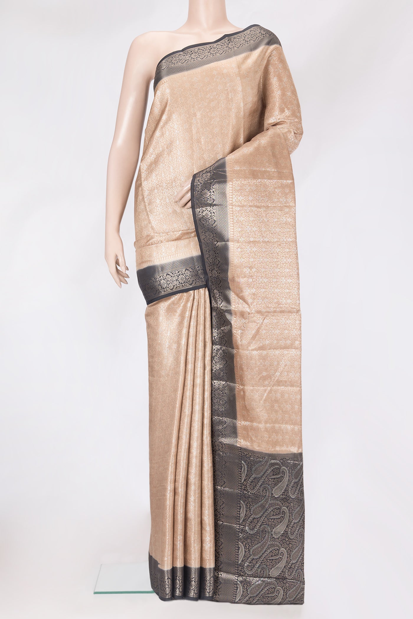 Beige Dual Tone Tussar Silk Saree with Zari Brocade on the body and Zari Border.  displayed on a mannequin